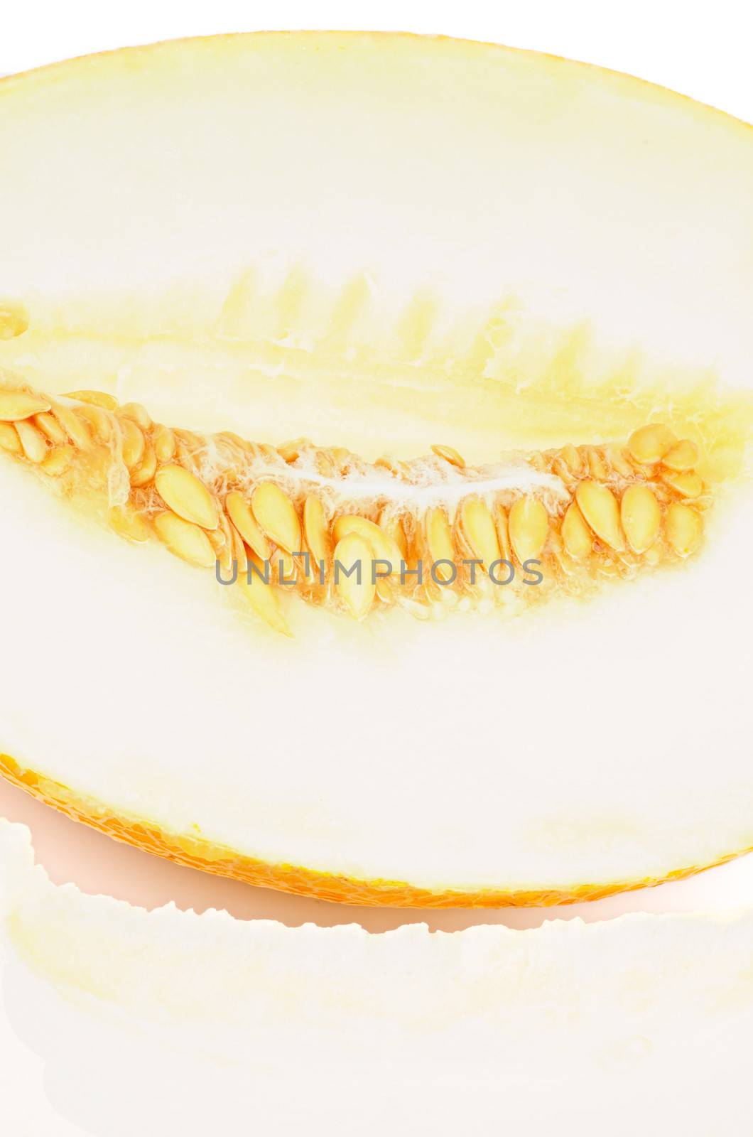 Half of Delicious Ripe Cantaloupe Honeydew Melon and Slice closeup