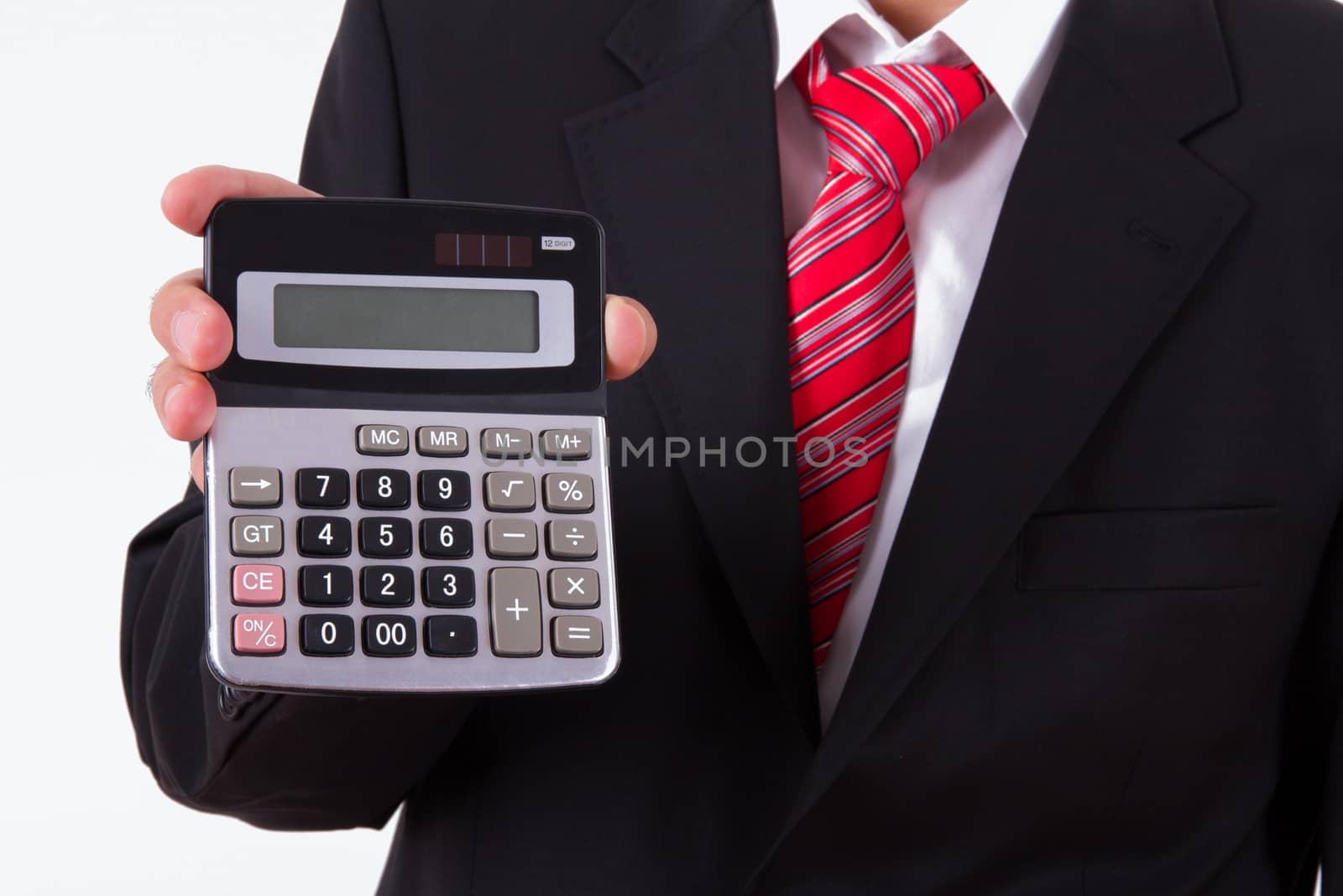 Businessman showing calculator, isolated on white.