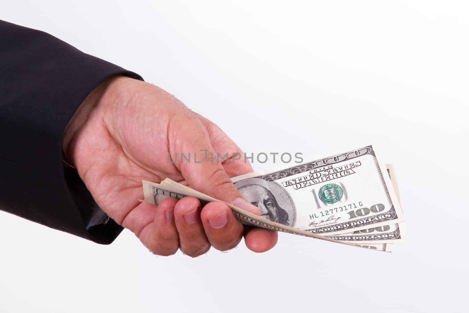Businessman buying, selling something and giving dollars which holding, isolated on white background.