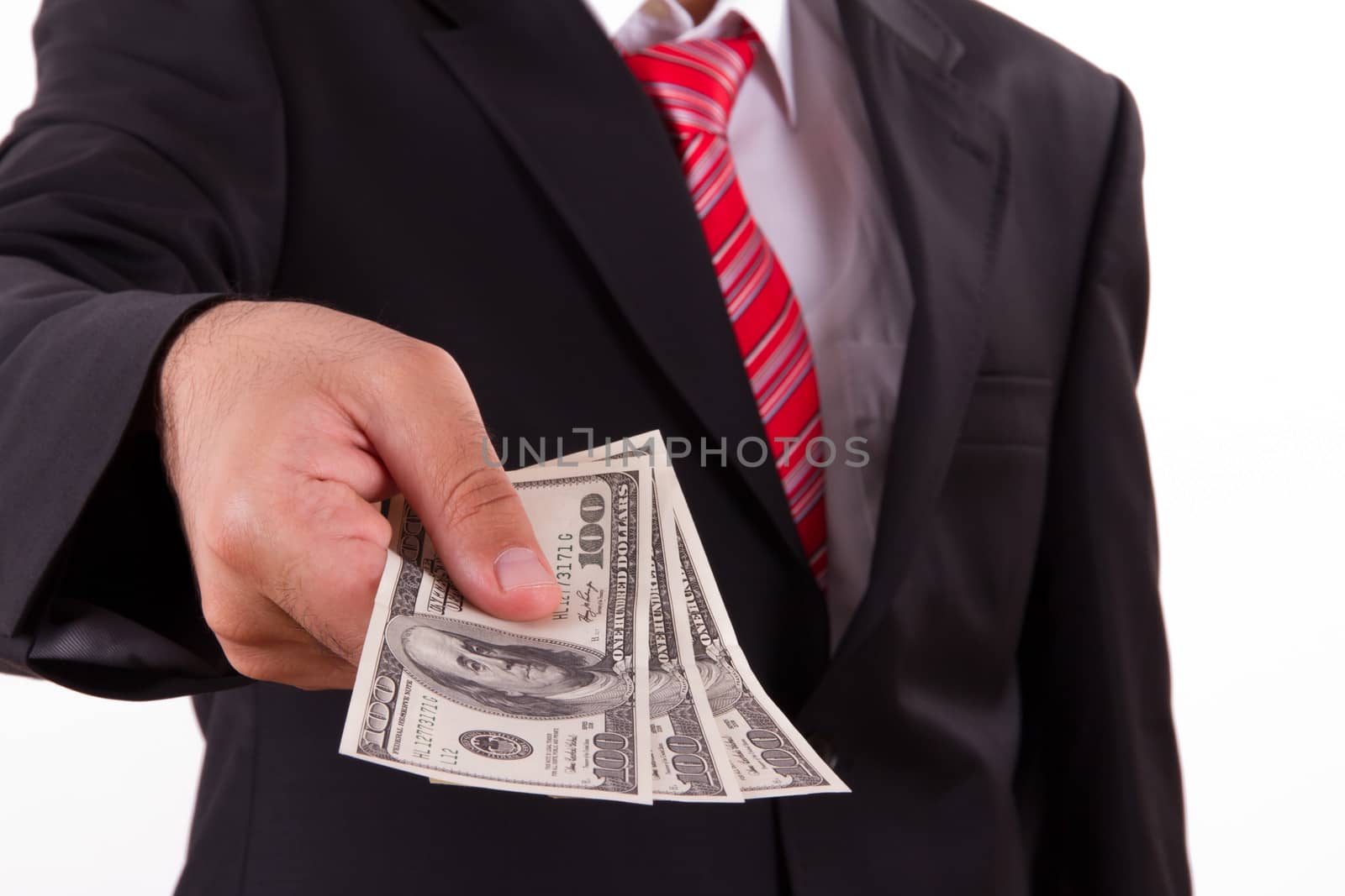 Businessman buying, selling something and giving dollars which holding.