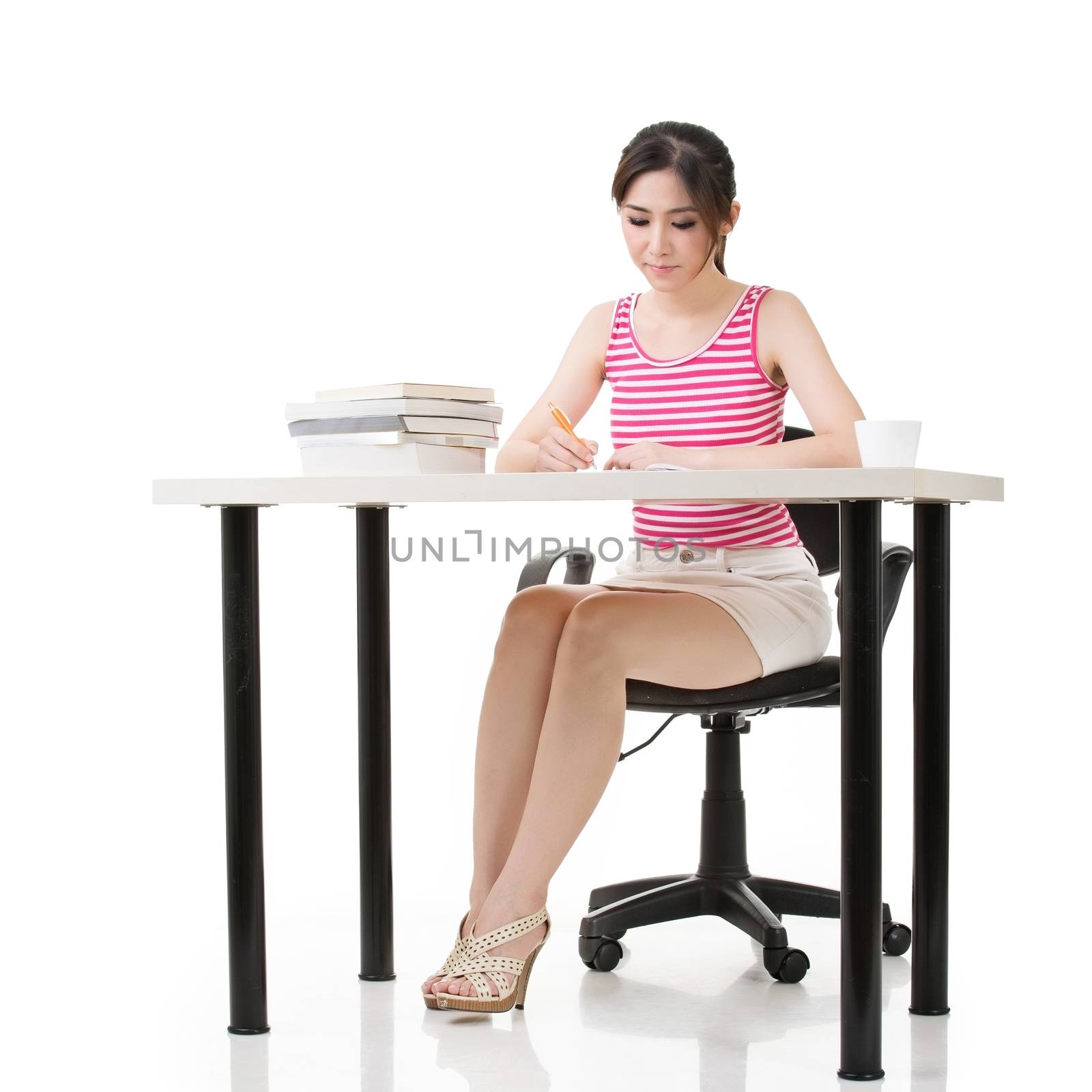 Asian lady work with desk, full length portrait on white background.