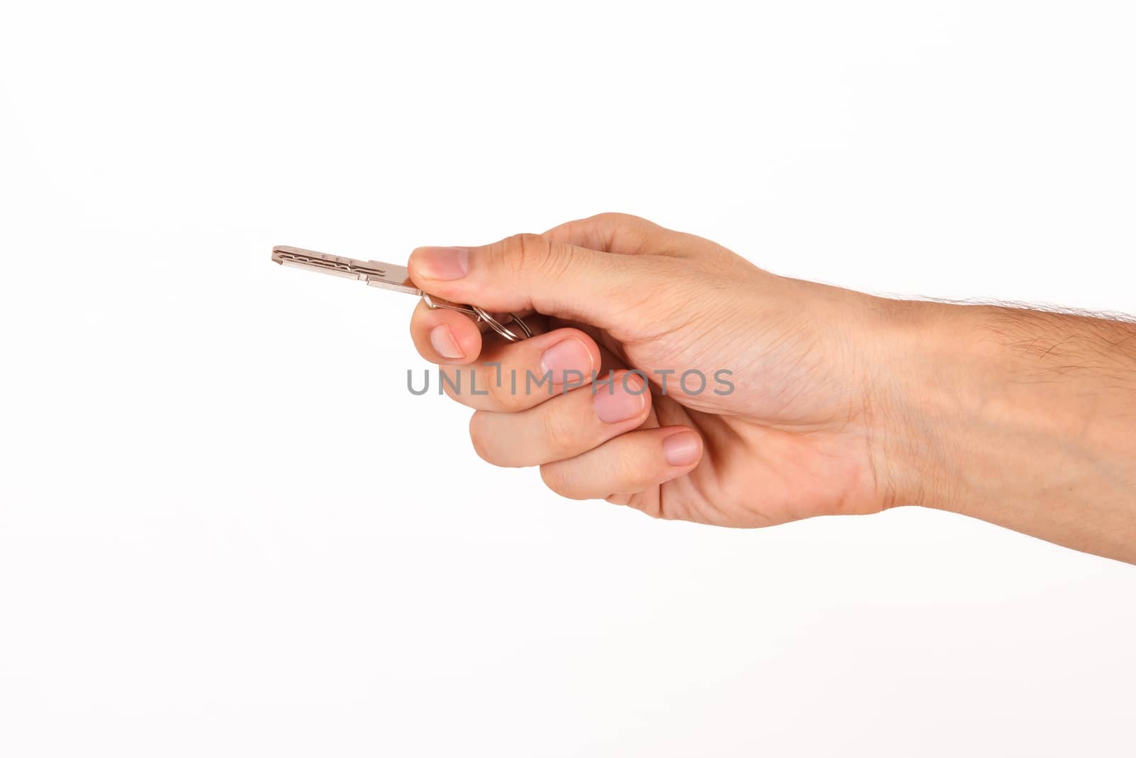 Human hand and key, isolated on white background.