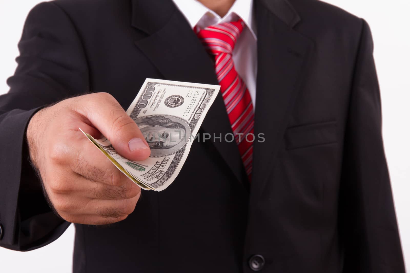 Businessman buying, selling something and giving dollars which holding.