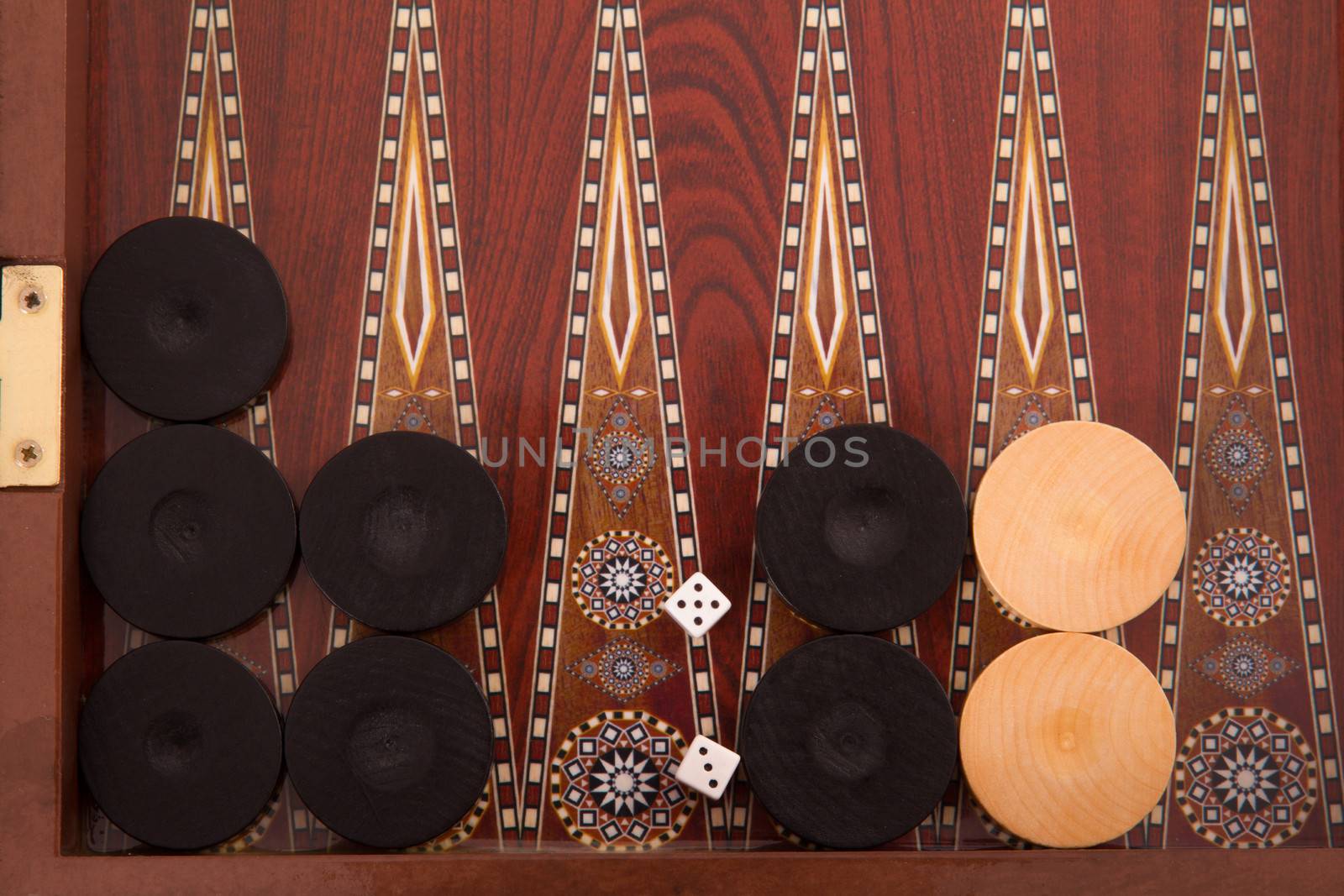 Backgammon chips and dices, top view.