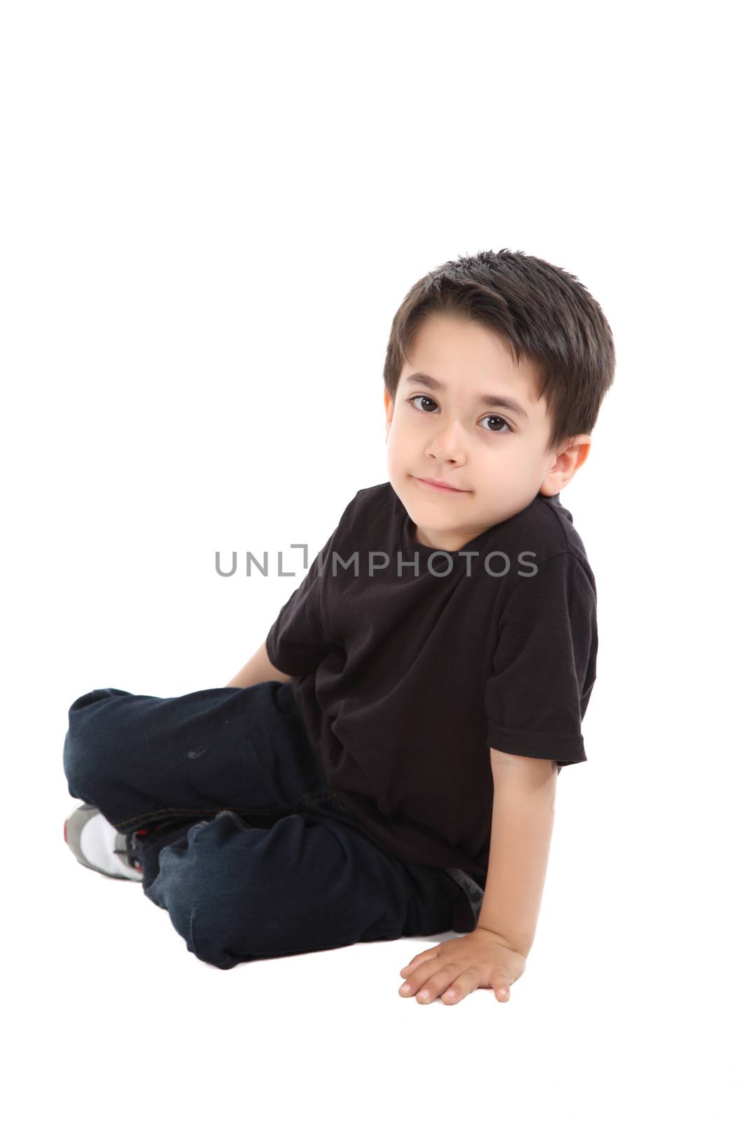 Young boy in studio with black shirt and jeans