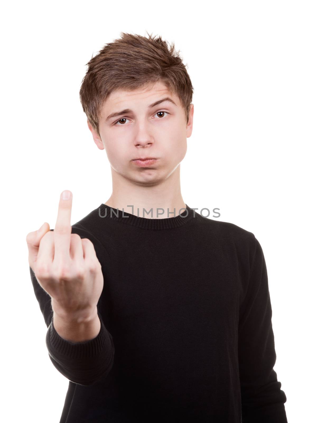 Sullen teenager shows the middle finger. Isolated on a white background
