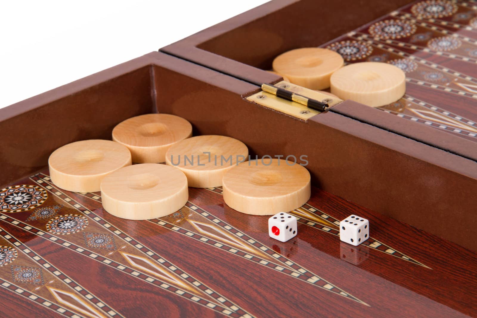 Backgammon table, chips and dices with five and six.