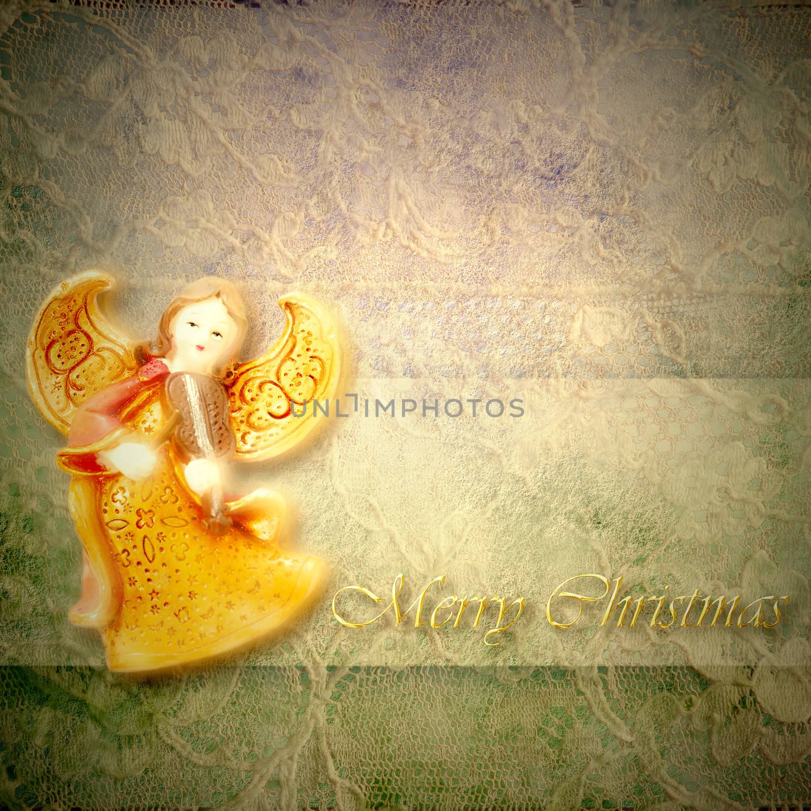 Angel musician on lace background with merry christmas text in gold letters