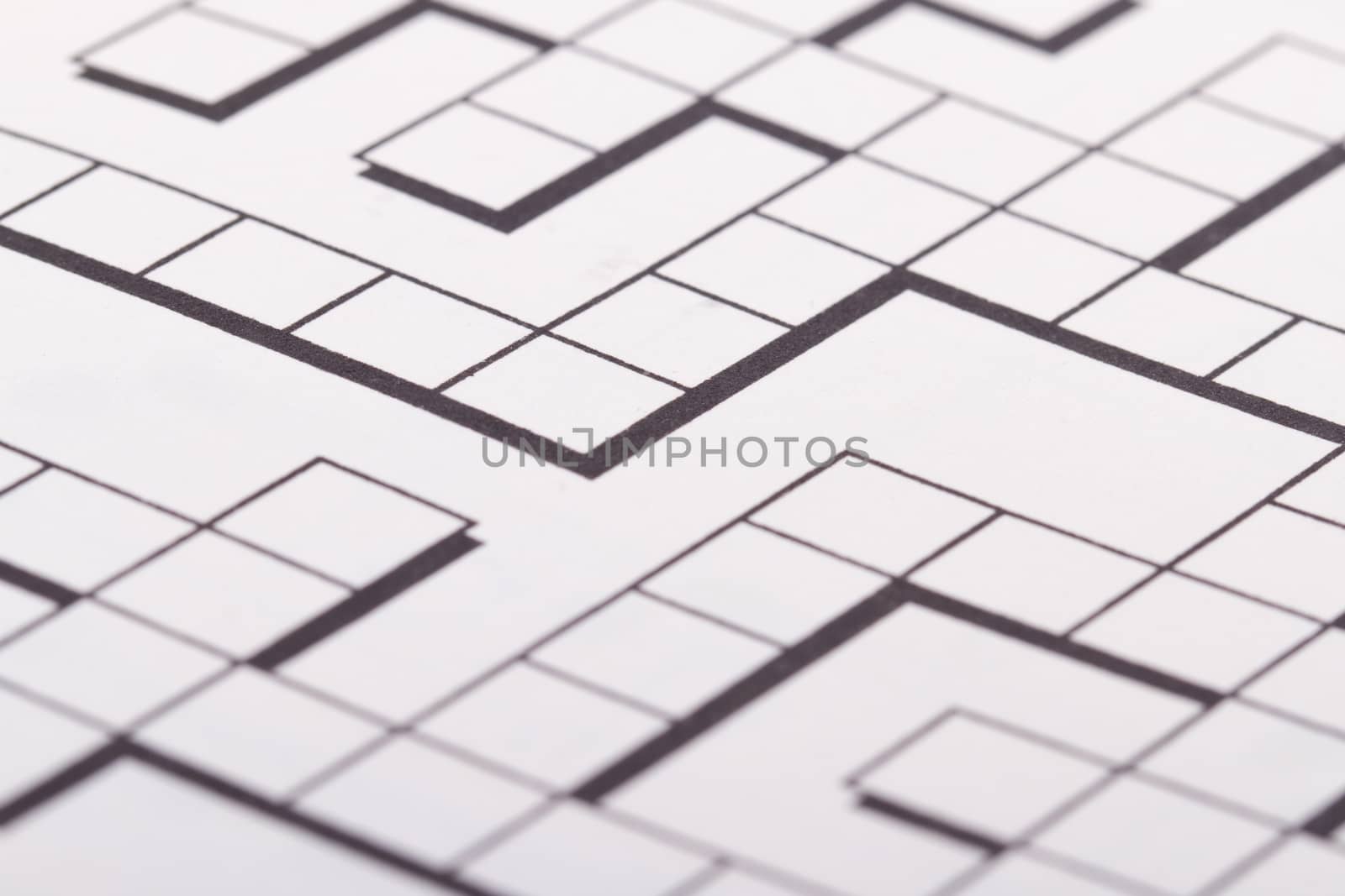 Close up of blank square crossword puzzle.