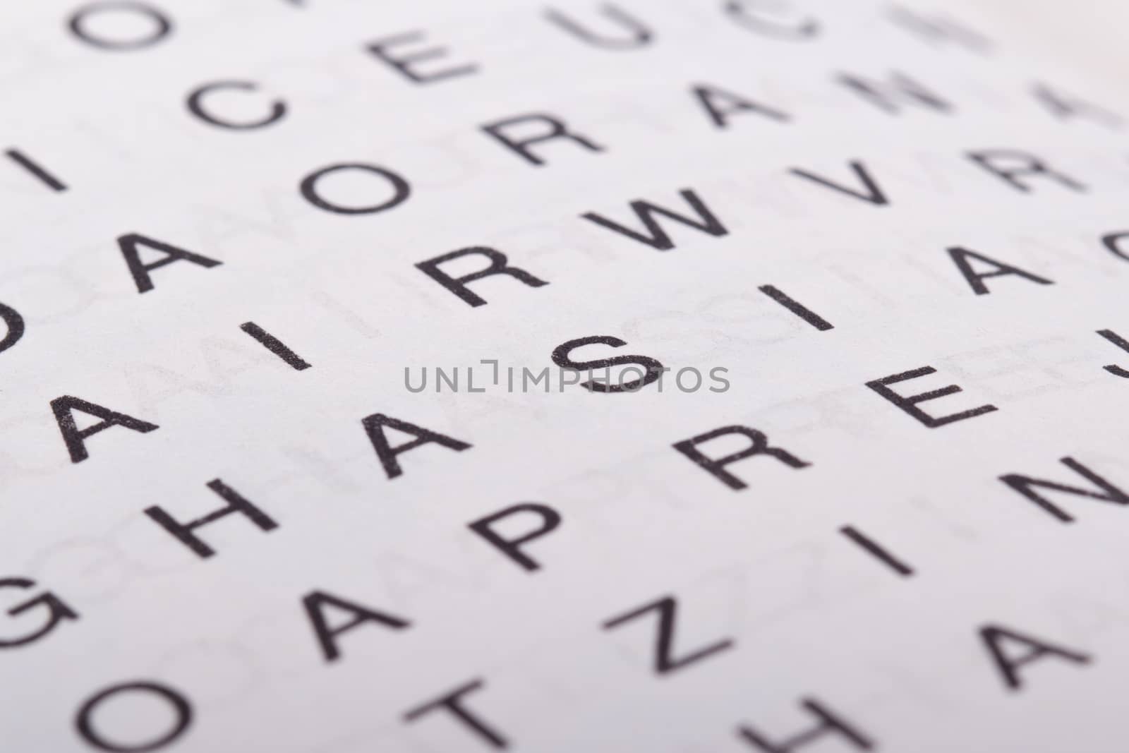 Close up of letter crossword puzzle for solving.