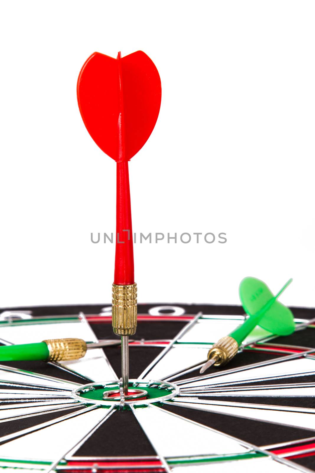 Red and green arrows and dart board, isolated on white background.