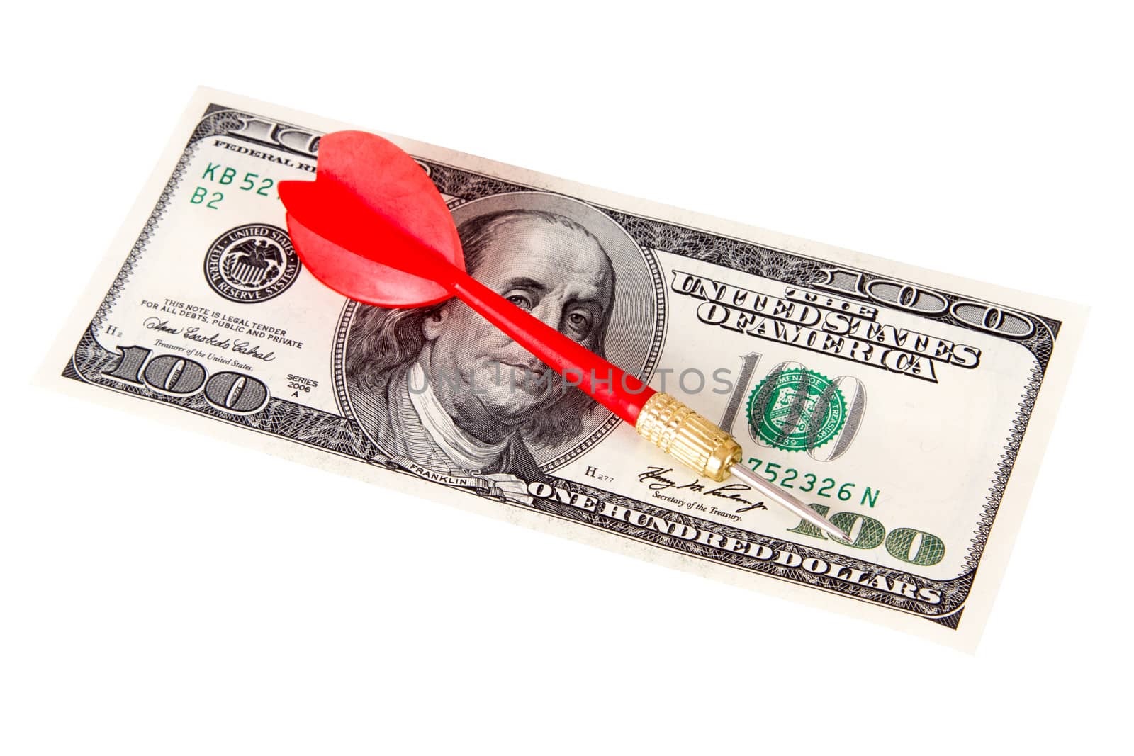Red, plastic arrow and one hundred dollar bill, isolated on white background.