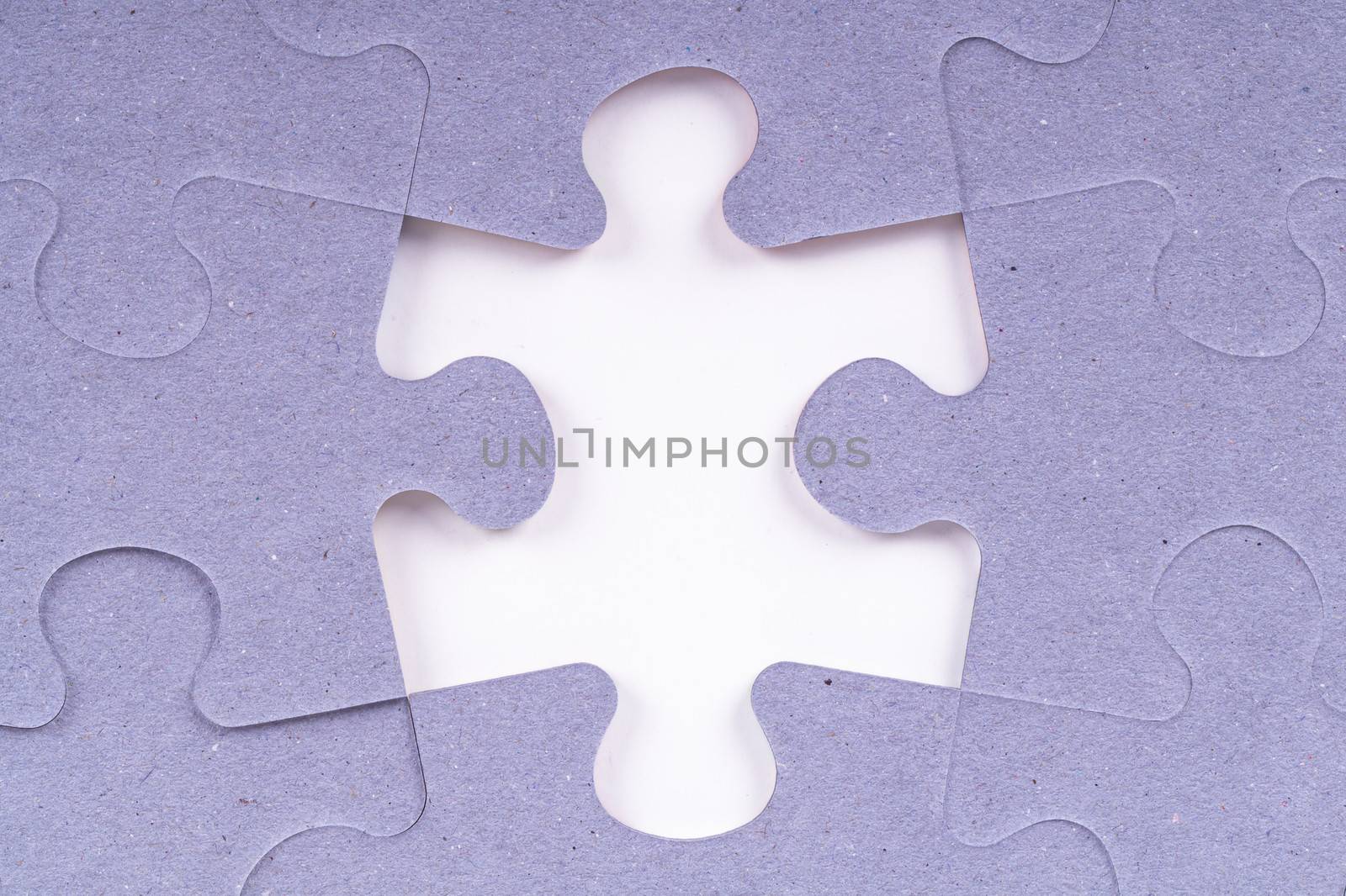 Puzzle pieces with missing piece.