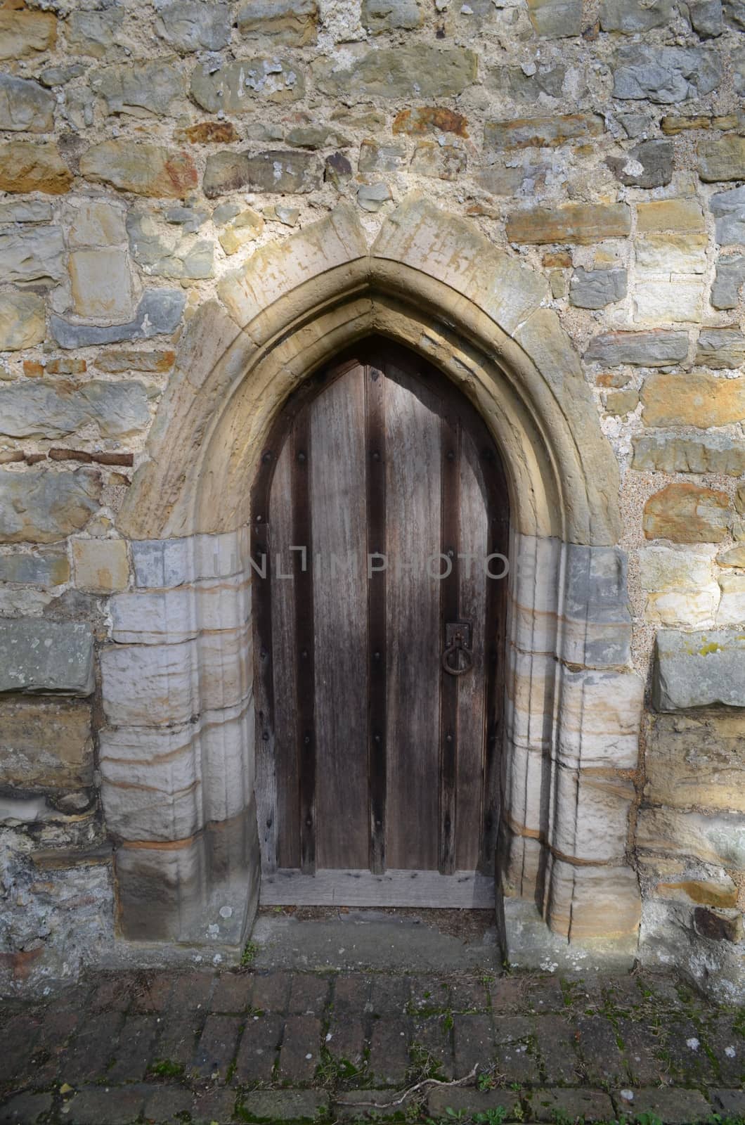 Church side door belonging to the fourteenth century church of St Peters in the small Sussex village of Ardingly.