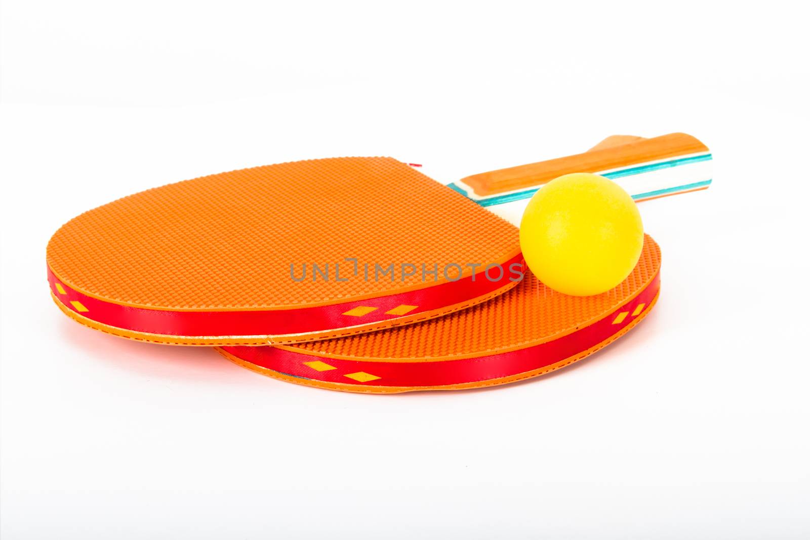 Two rackets for playing table tennis, isolated on white background.