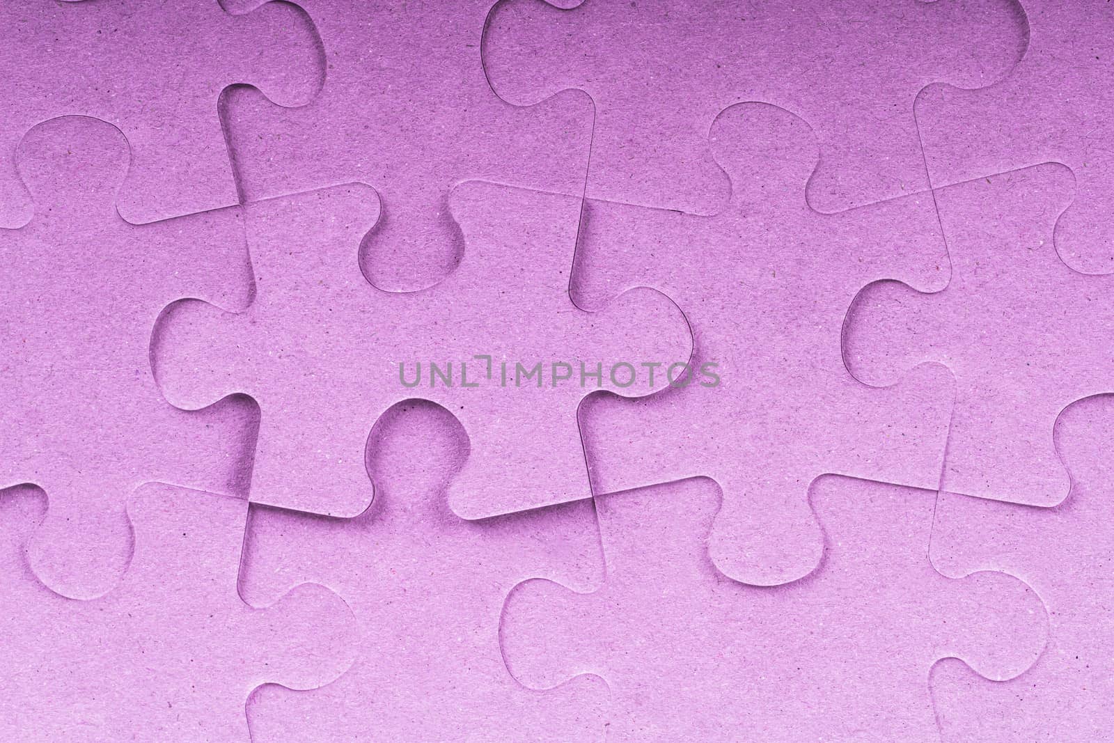 Pink complete puzzle pieces.