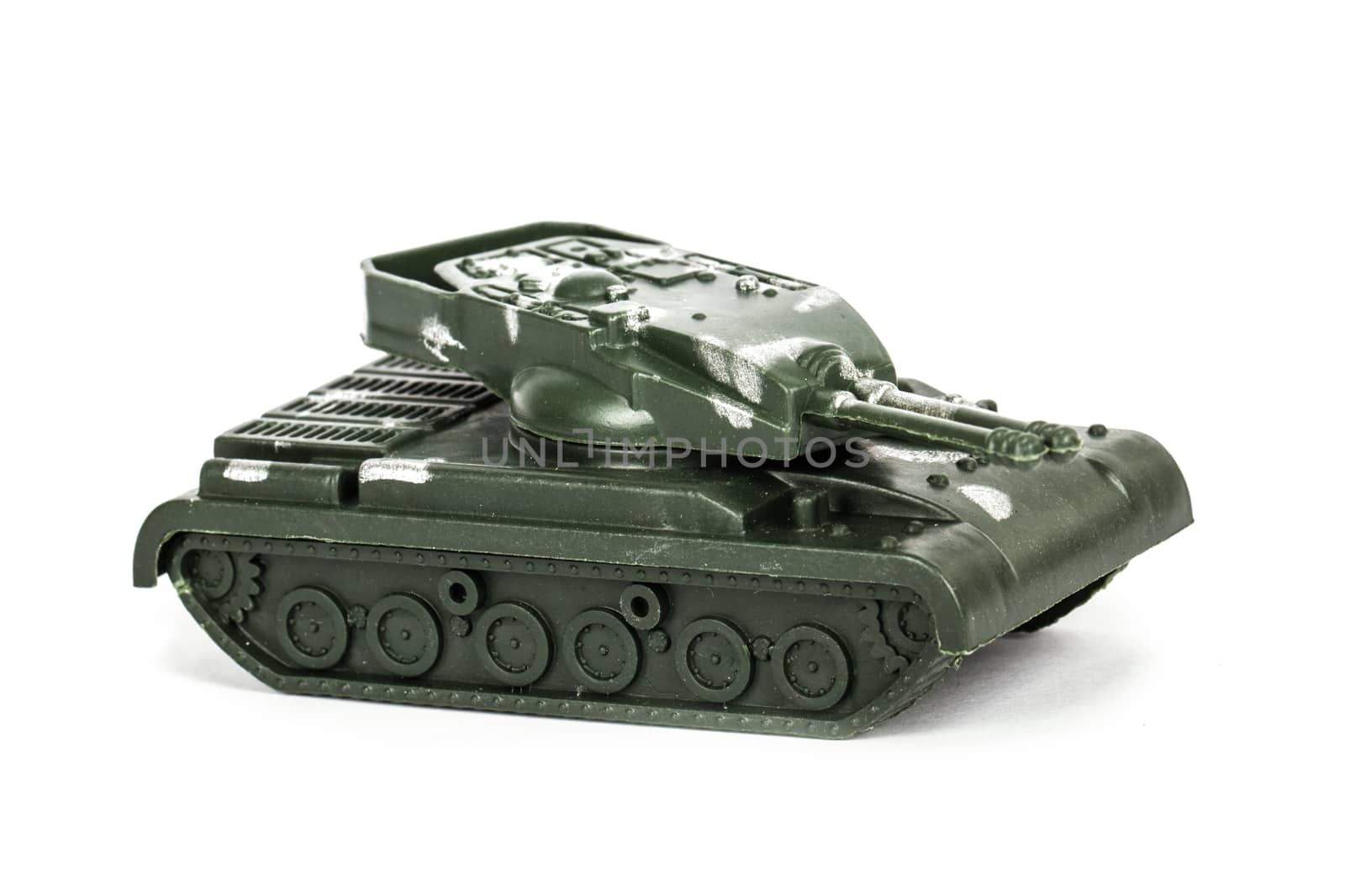 Miniature toy tank, isolated on white background.