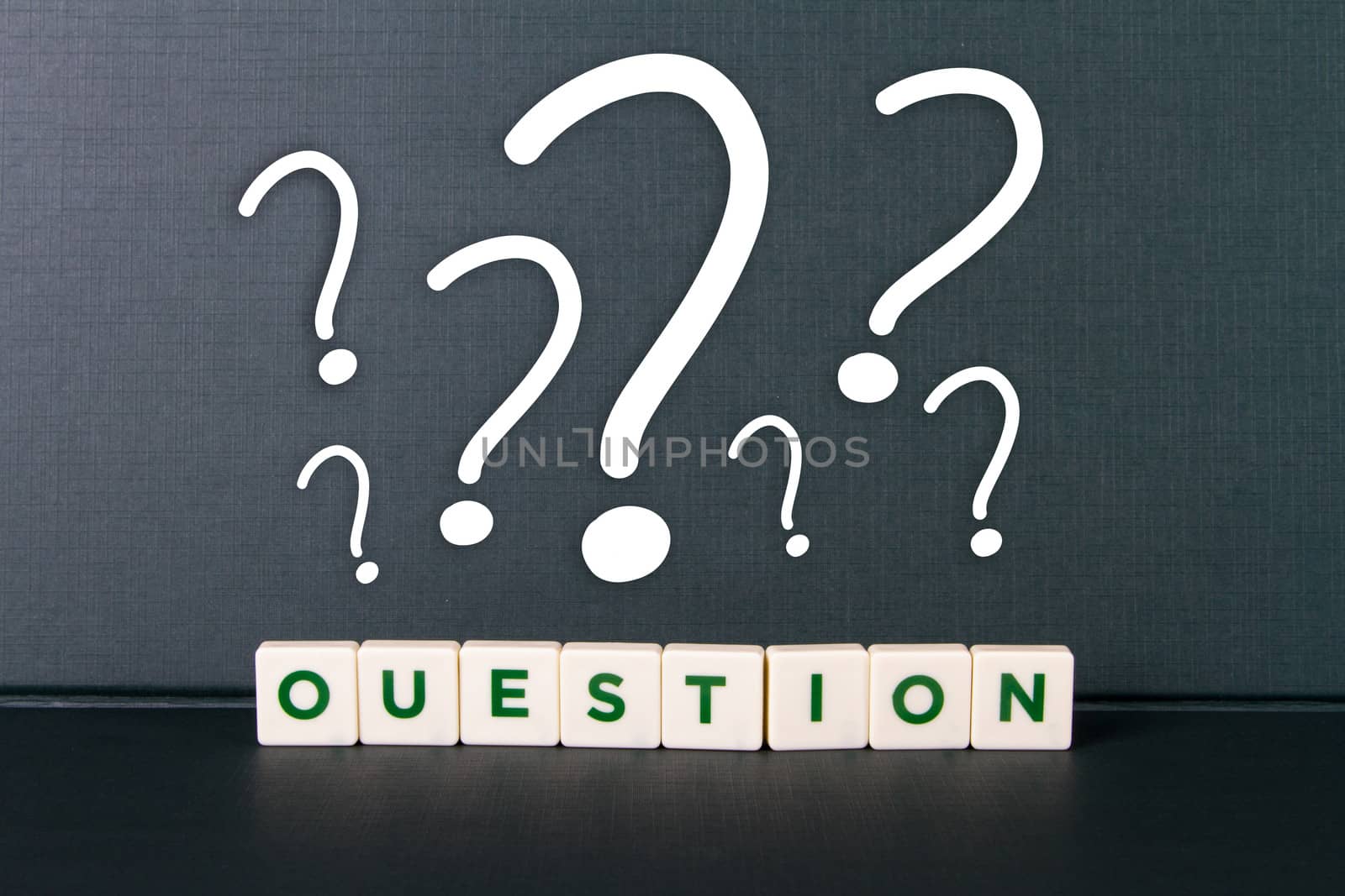 Question word in letters and question mark icons.