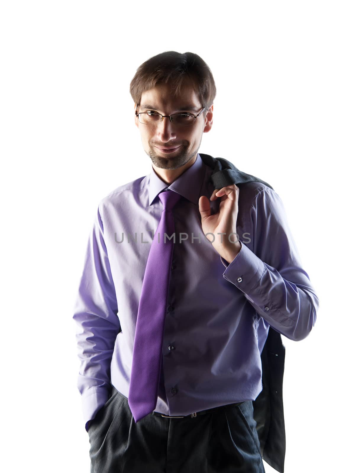 Businessman smiling with his jacket over shoulder