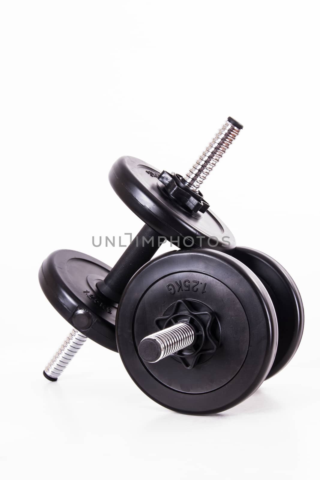Black gym barbell, dumbbell with disks, isolated on white background.