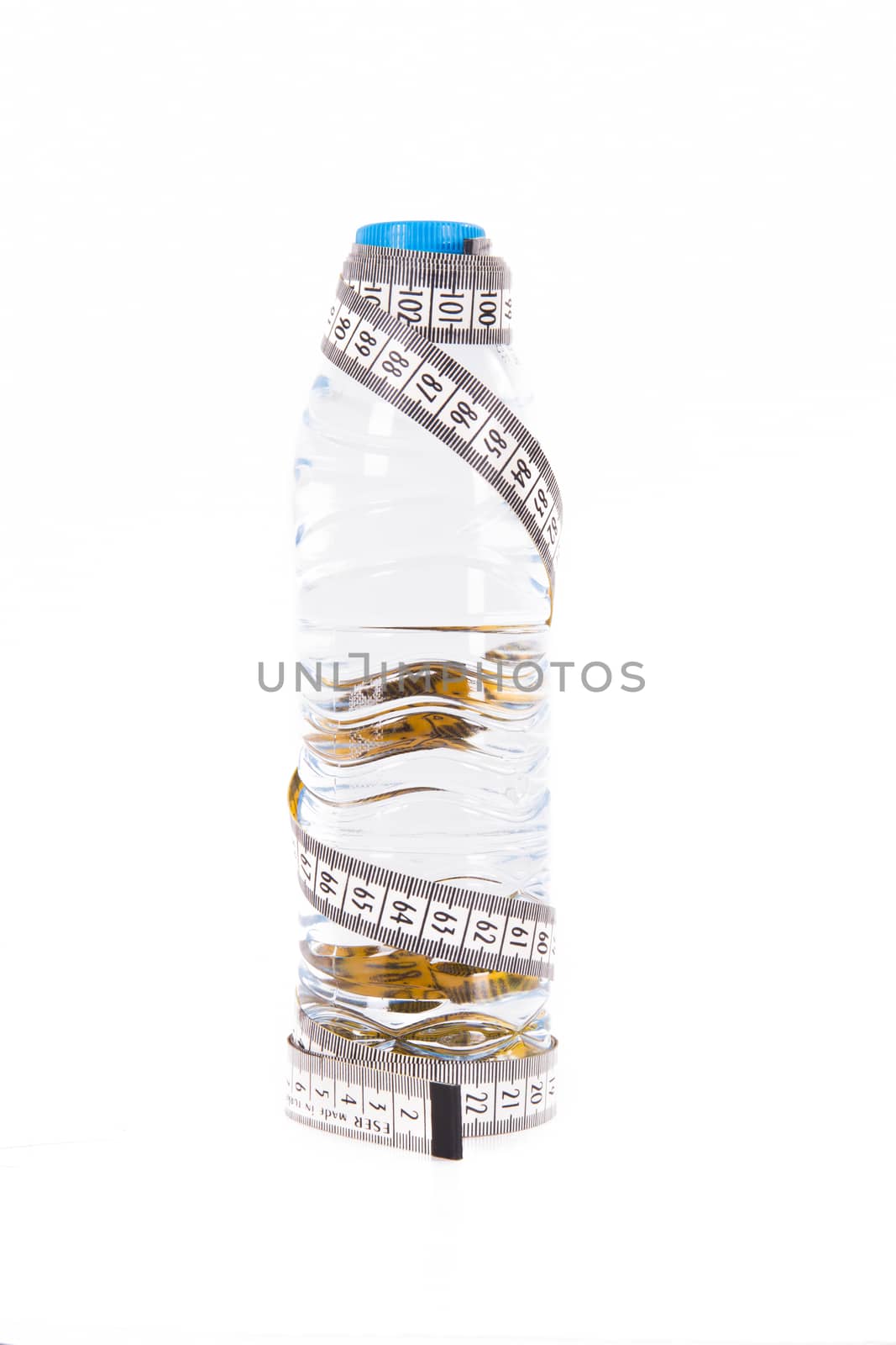 Plastic water bottle and tape measure, isolated on white background.