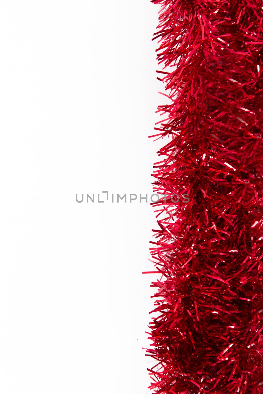 Red xmas ornament as border, isolated on white background.