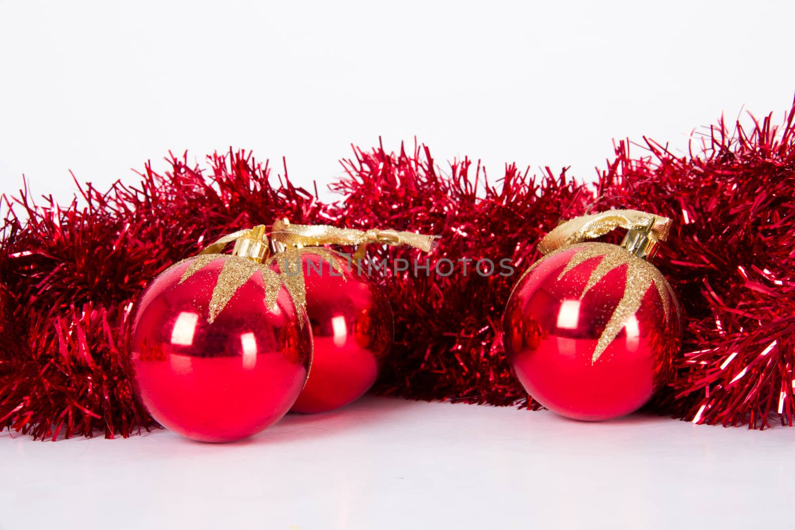 Christmas ornaments and red balls, isolated on white background.