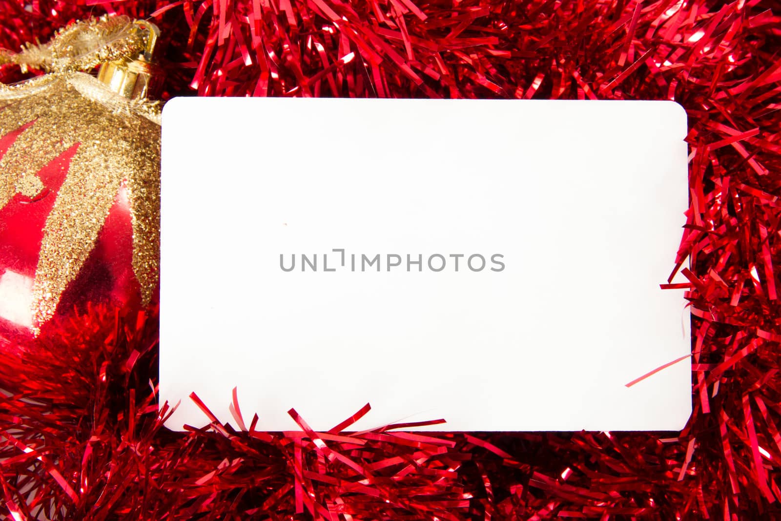 Blank white greeting card for your message on christmas ornaments