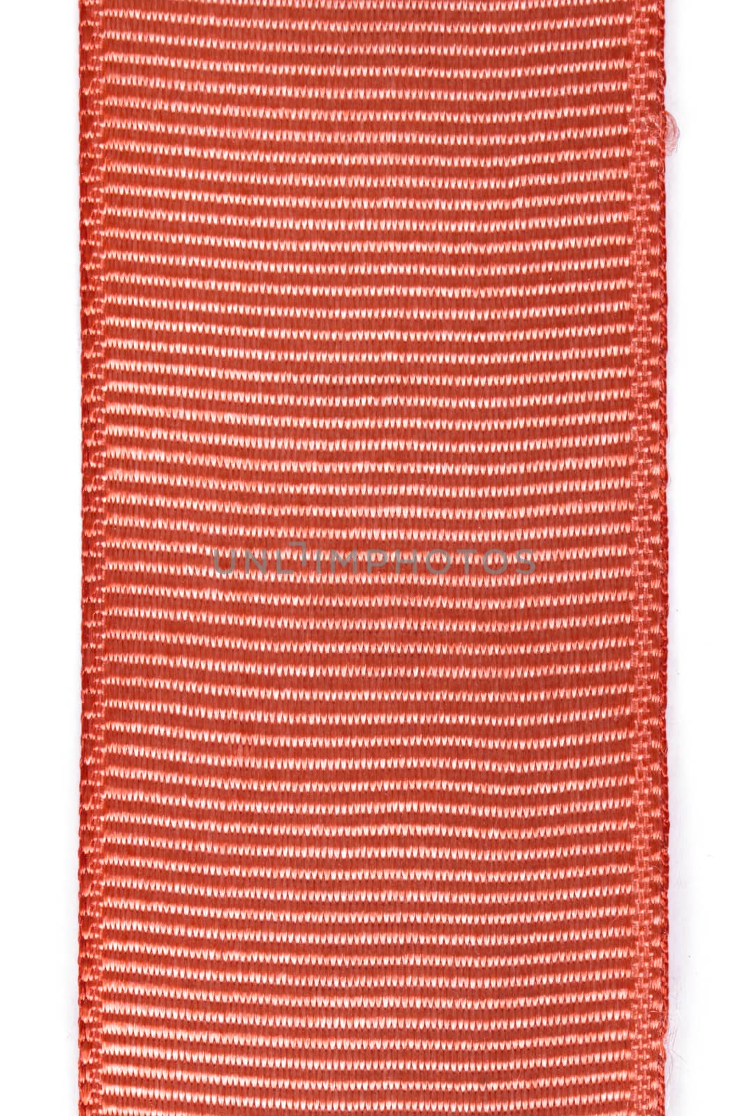 Detail of striped ribbon piece, isolated on white background.