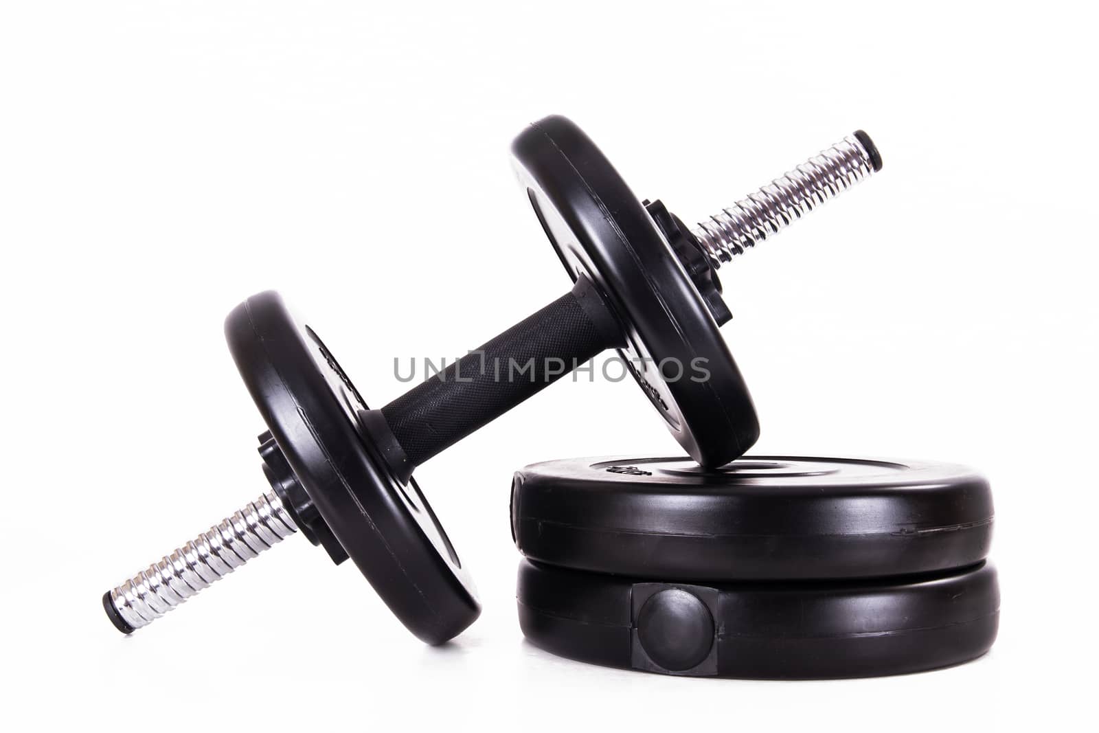 Black gym barbell, dumbbell with disks, isolated on white background.