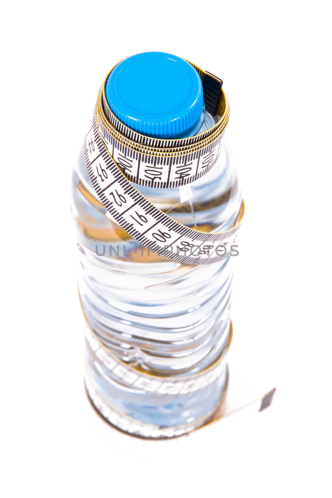 Plastic water bottle and tape measure, isolated on white background.