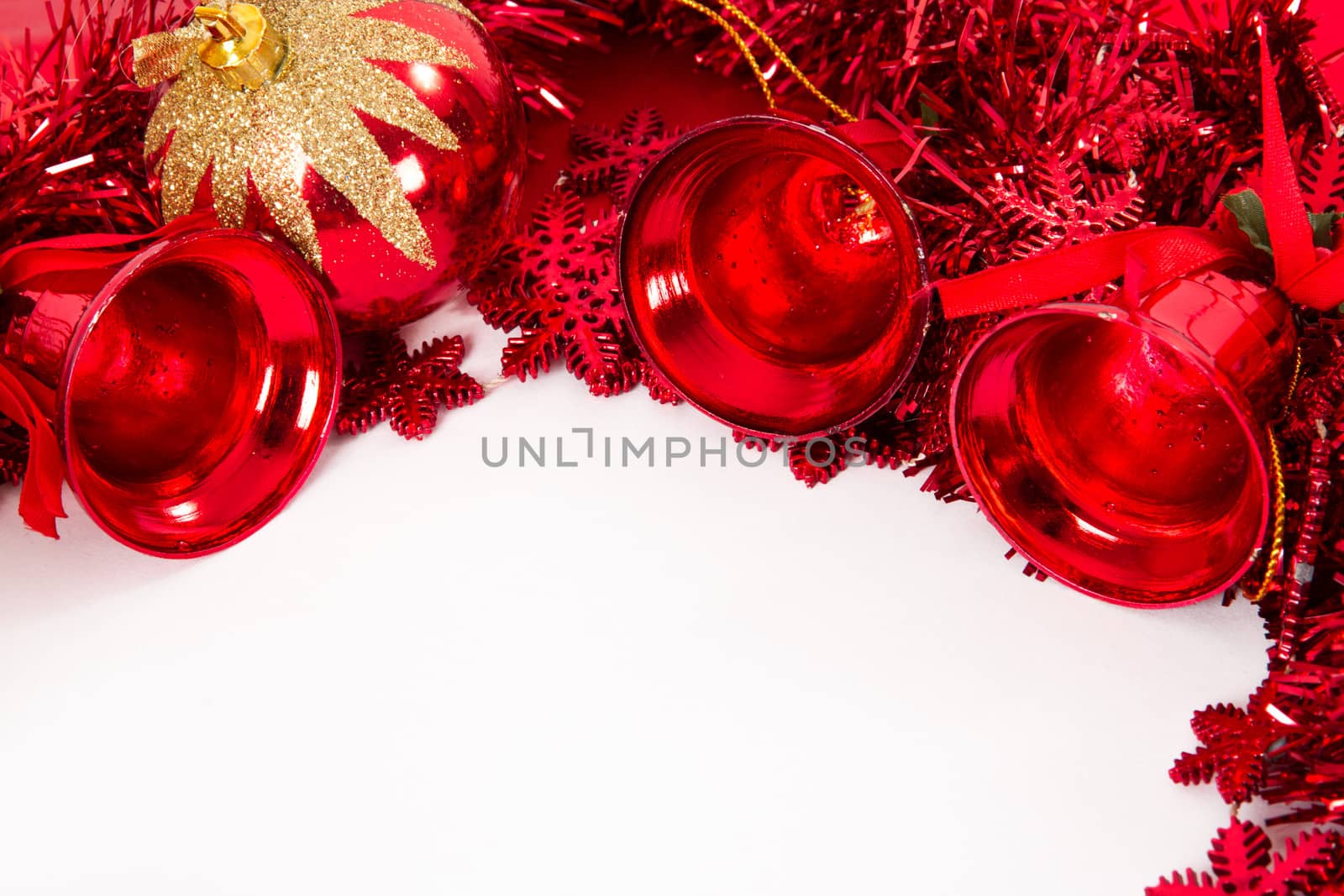 Christmas ornaments, balls, bells and stars with space, isolated on white background.