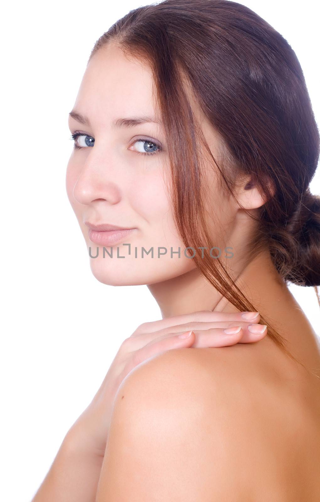 Portrait of beautiful young girl with clean skin on pretty face - white background