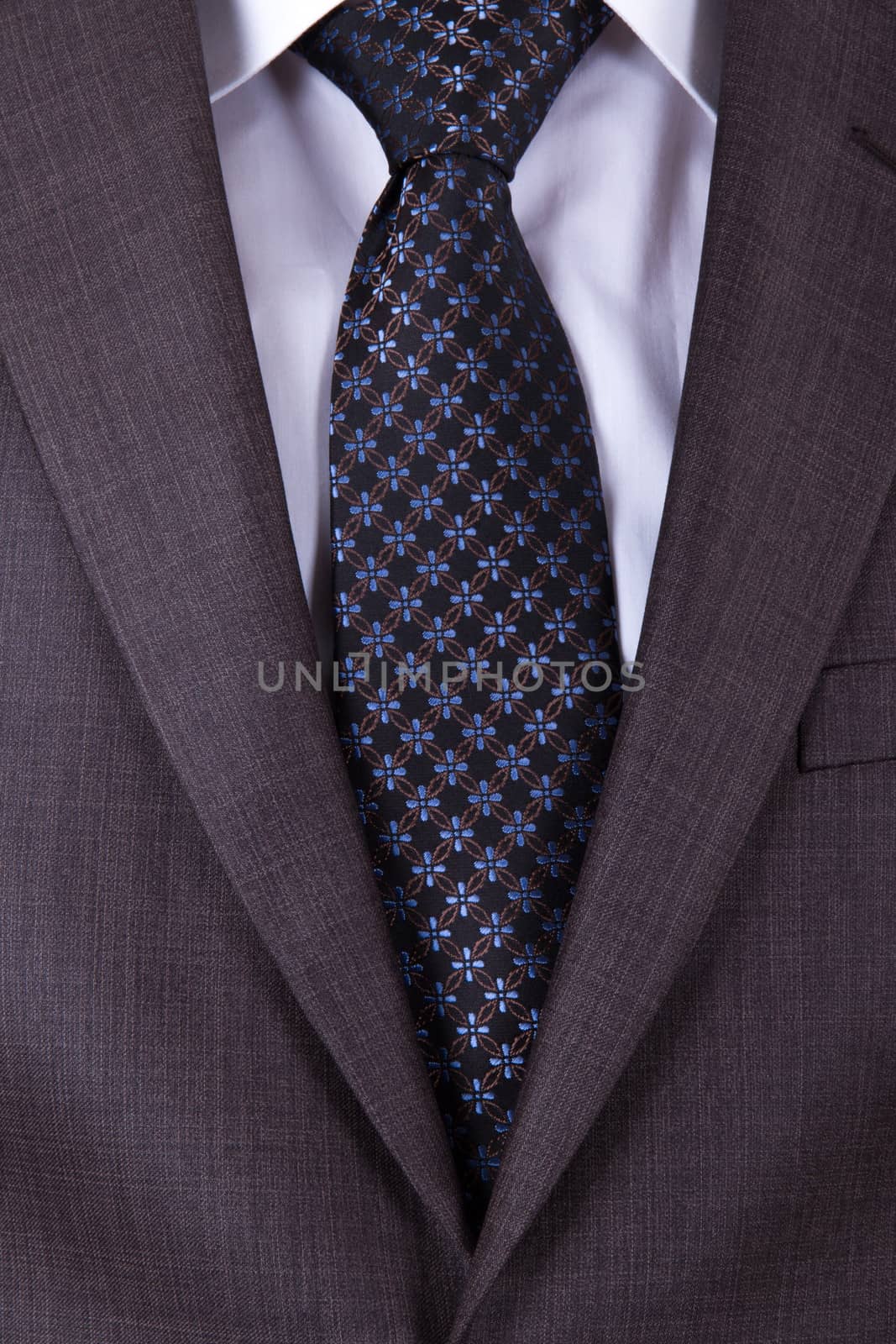 Smart businessman with tie and jacket.