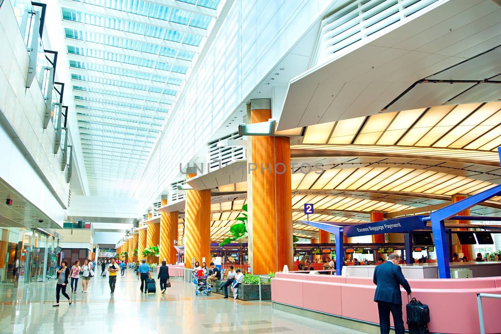 Singapore, Republic of Singapore - March 05, 2013: Modern interior of  Changi International Airport in Singapore. Changi Airport serves more than 100 airlines operating 6,100 weekly flights