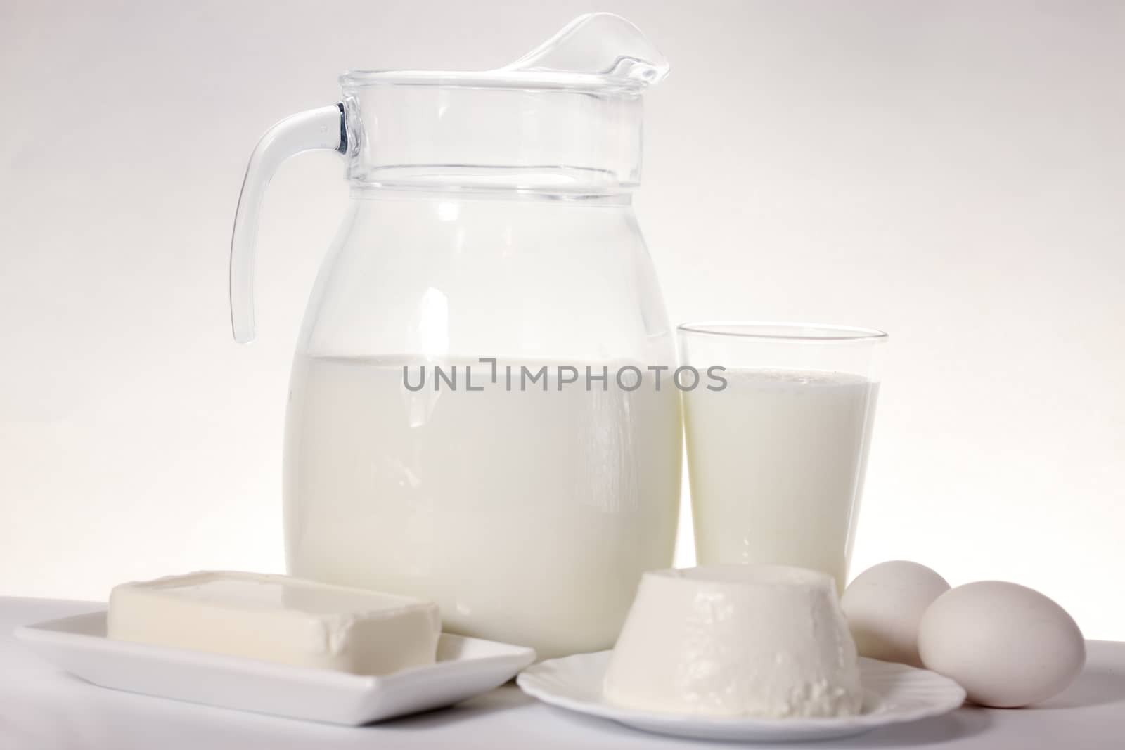 still life of dairy products and soft cheese varieties