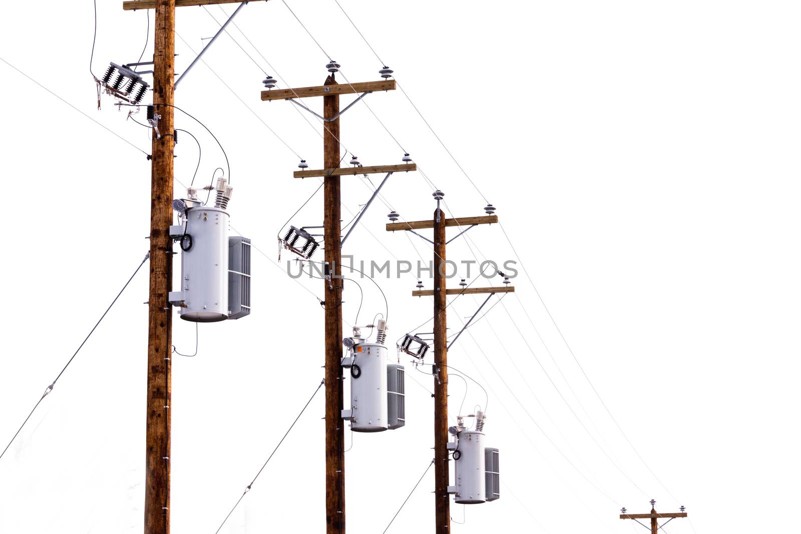 Row utility poles hung with electricity power cables and transformers for residential electric power supply isolated on white background