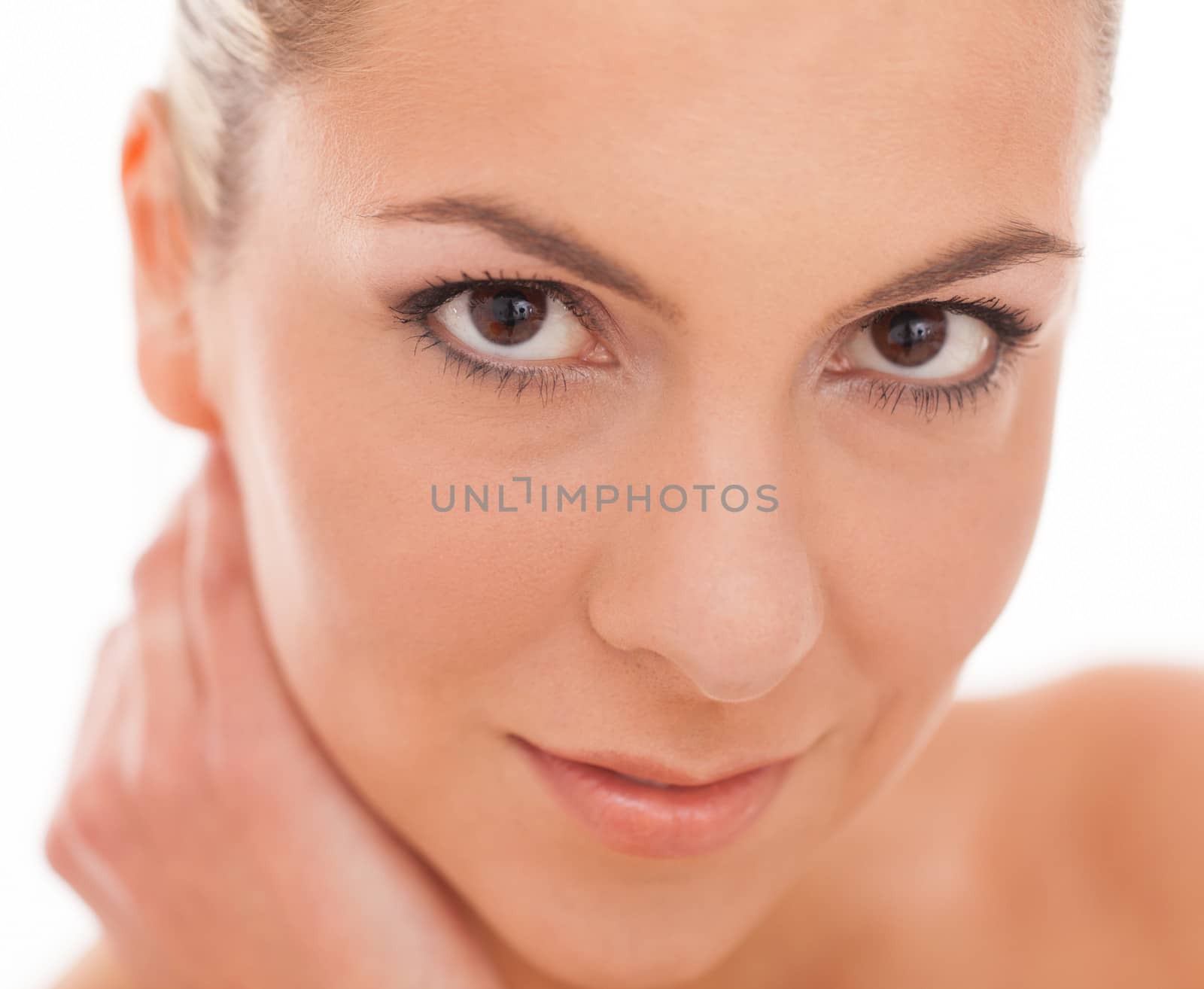 Closeup portrait of beautiful caucasian woman with day makeup