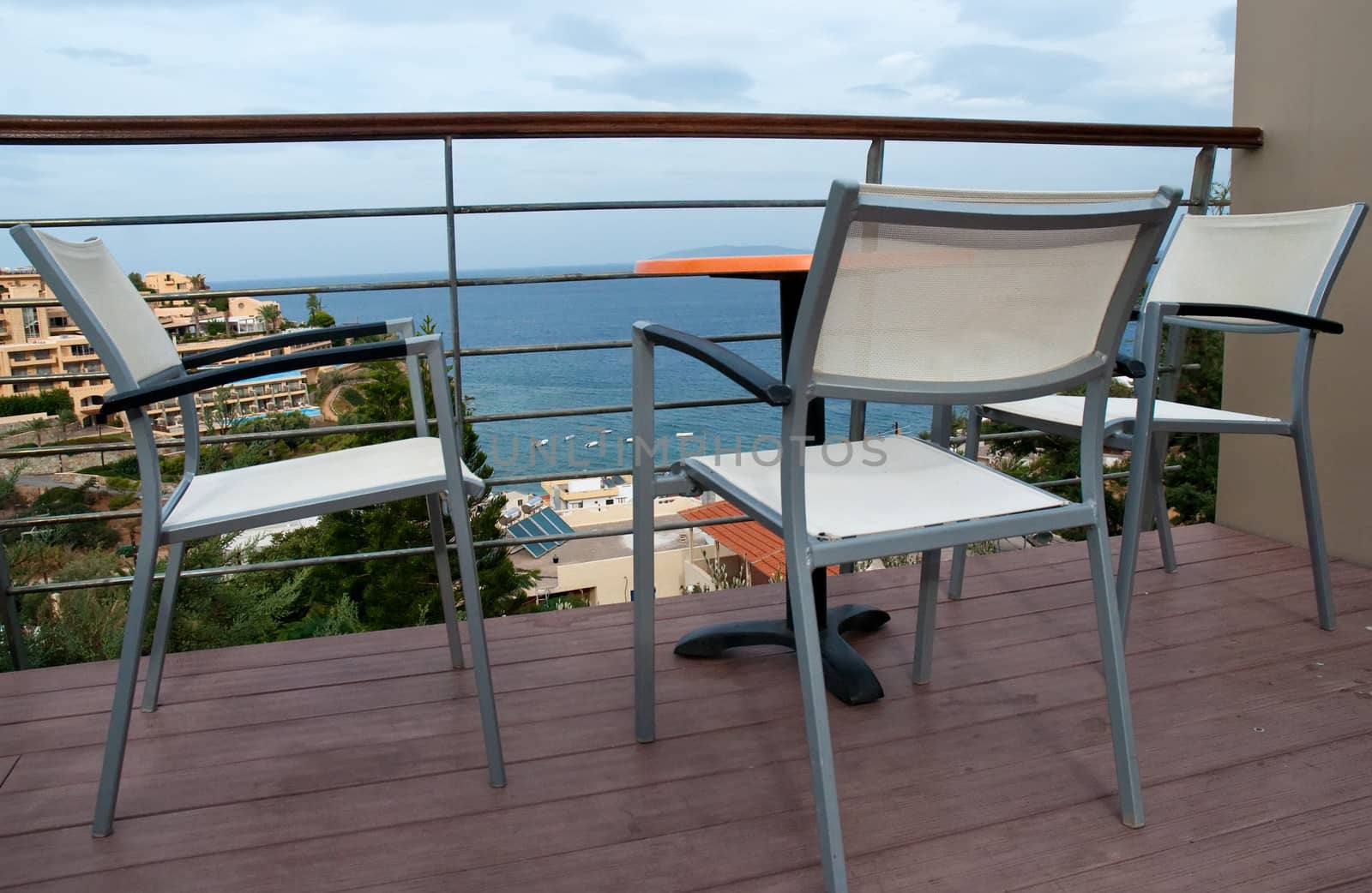 Chairs at sea view  area of  hotel, Crete, Greece .