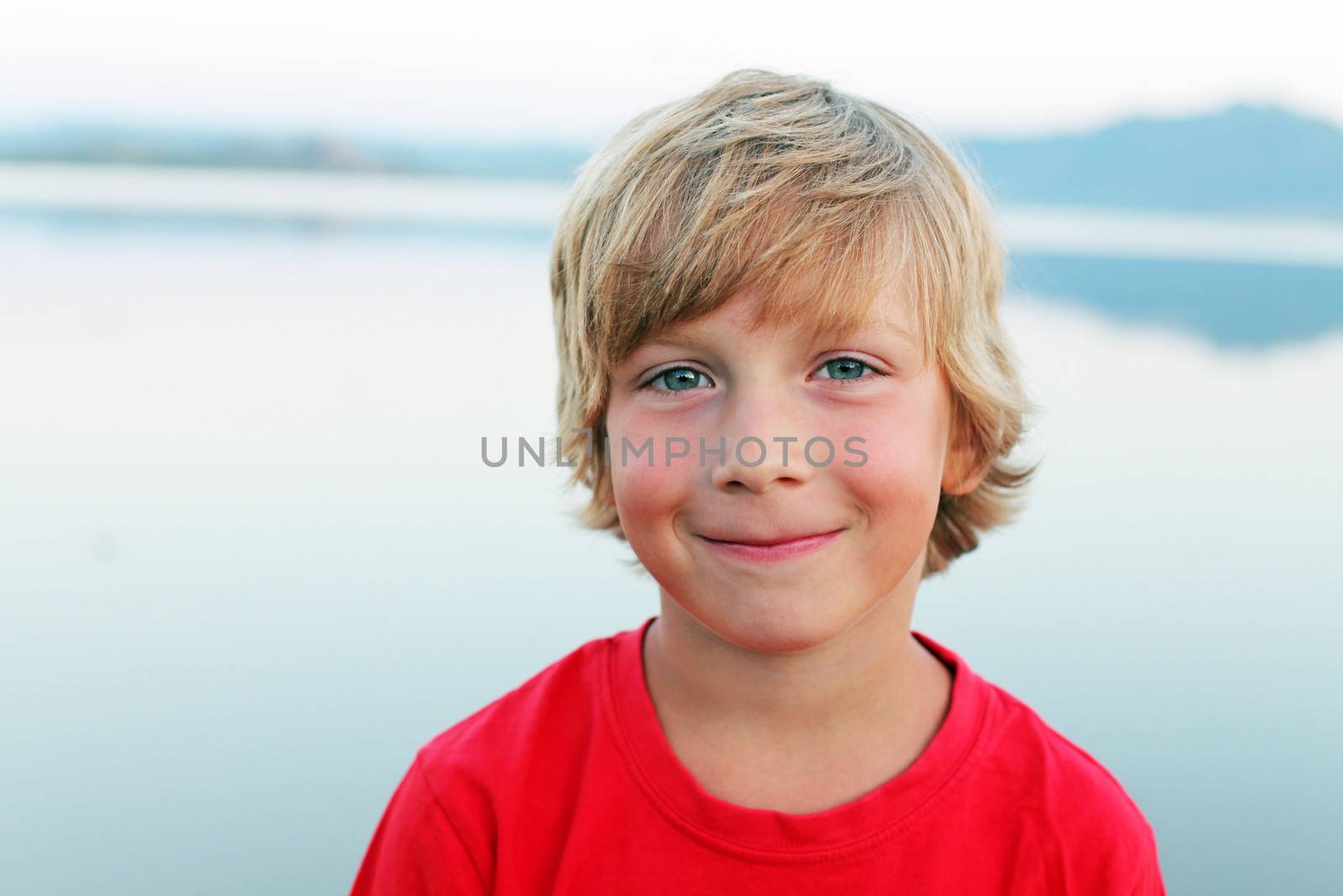 portrait of smiling boy by anelina