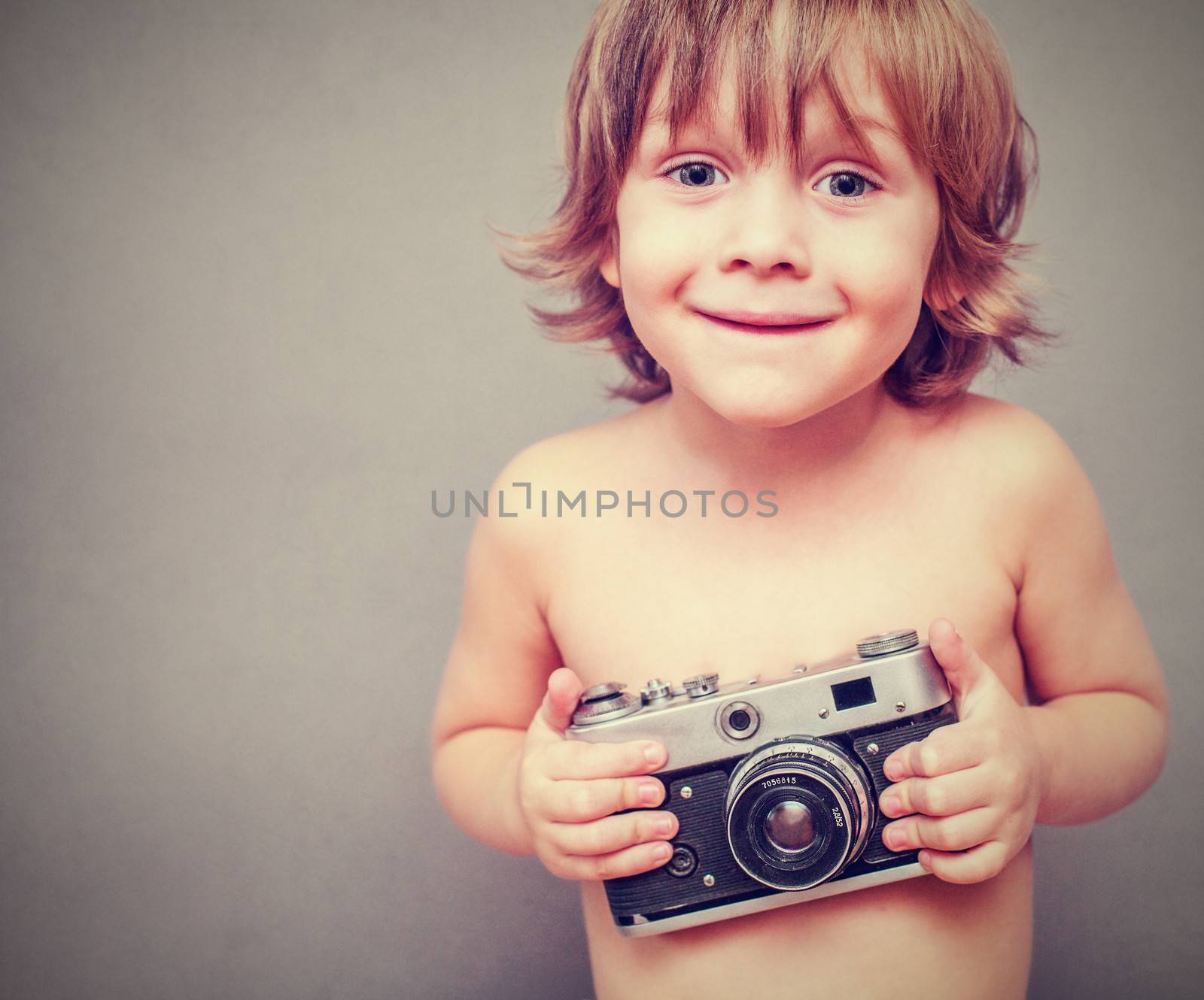 boy with an old camera by anelina