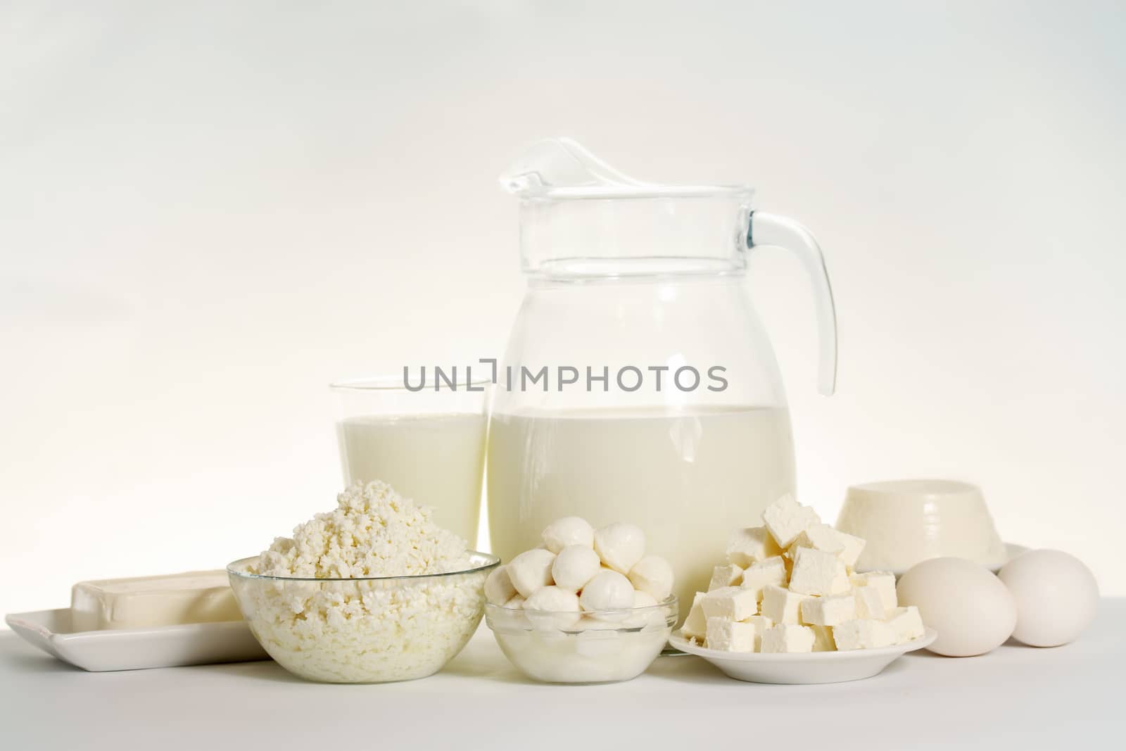 still life of dairy products and soft cheese varieties