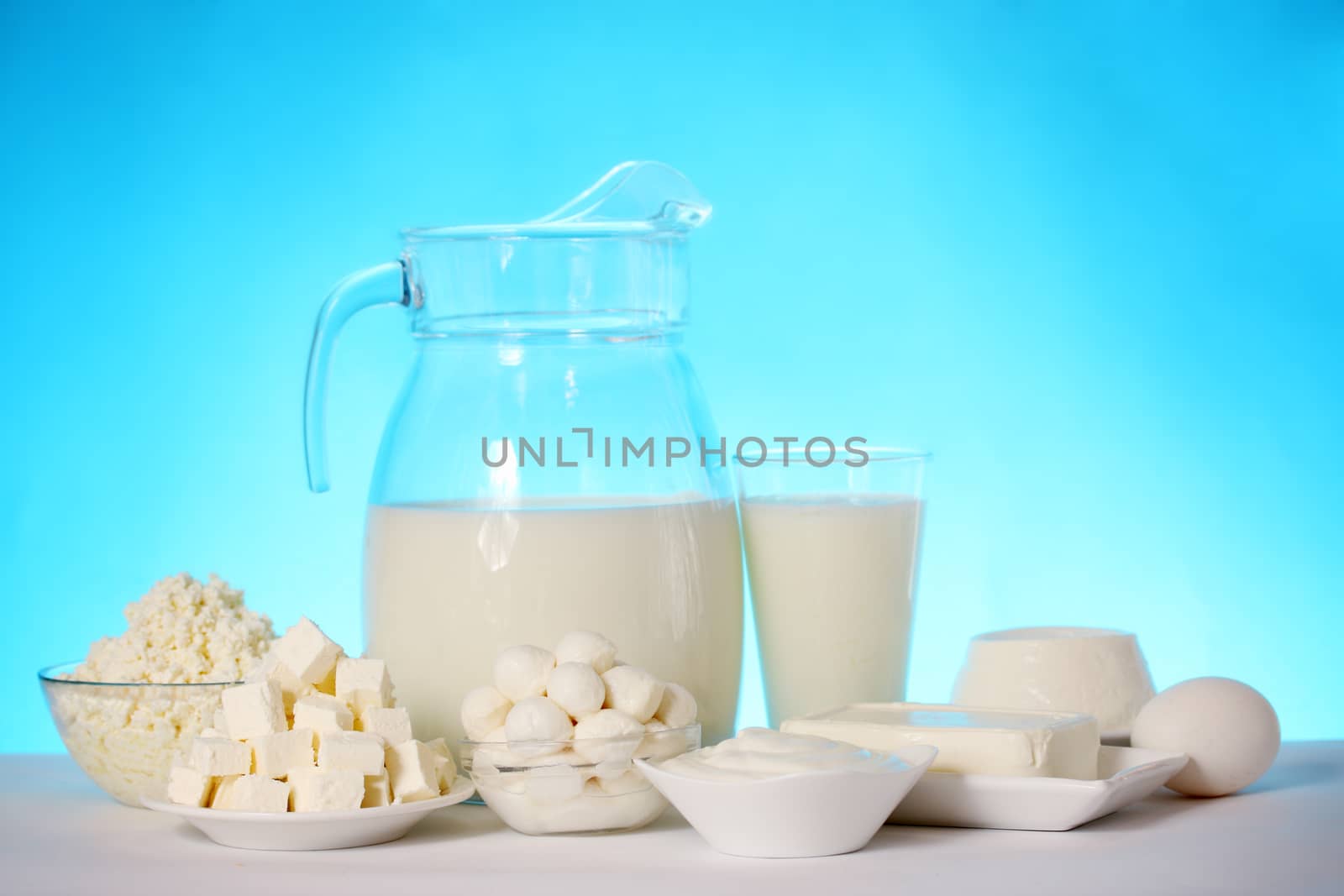 still life of dairy products and soft cheese varieties