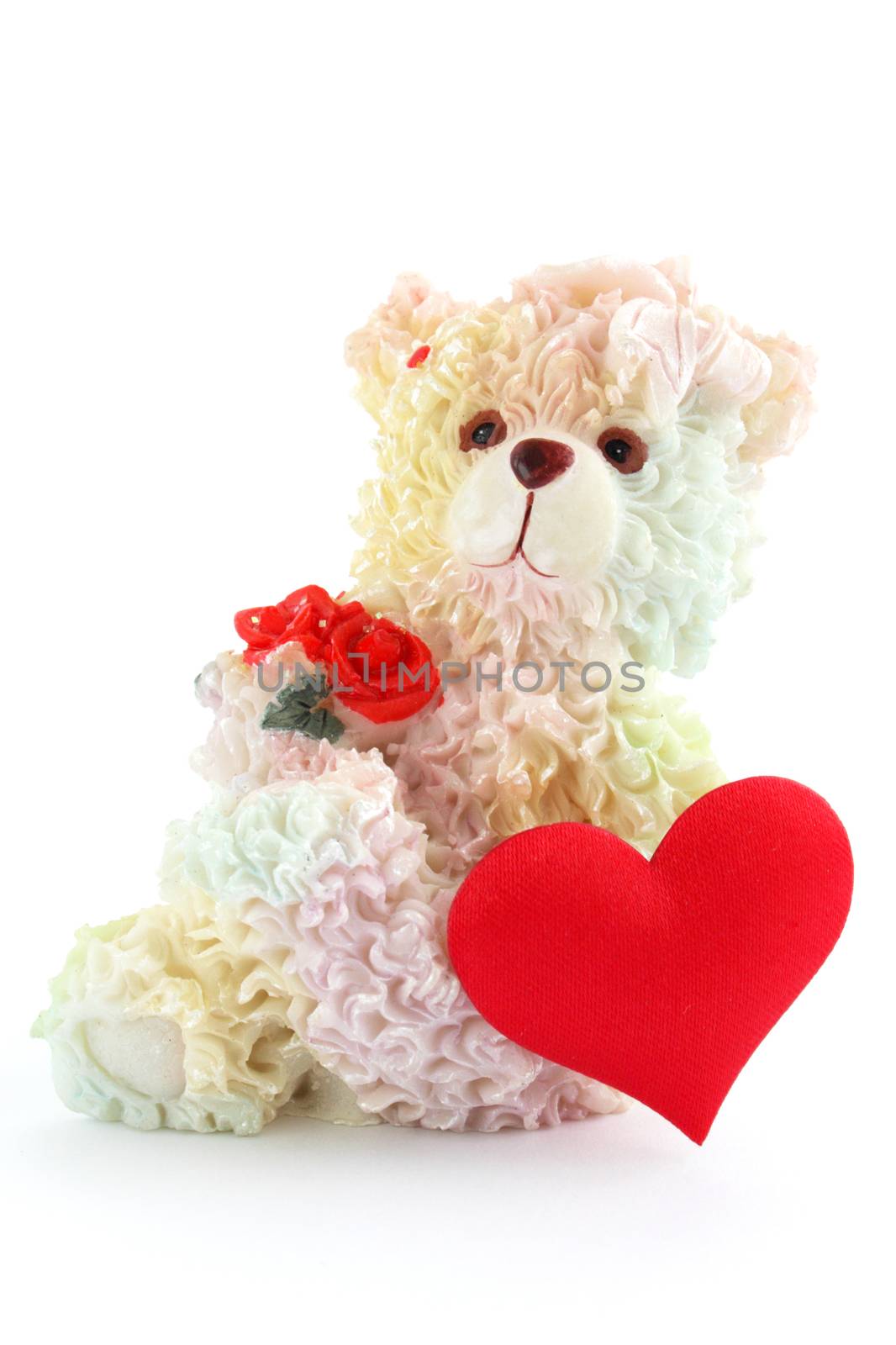 Bear, flowers and by heart against the white background