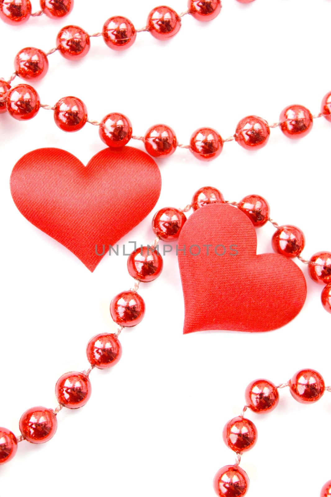 Pair of hearts with the beads during the day of saint Valentina