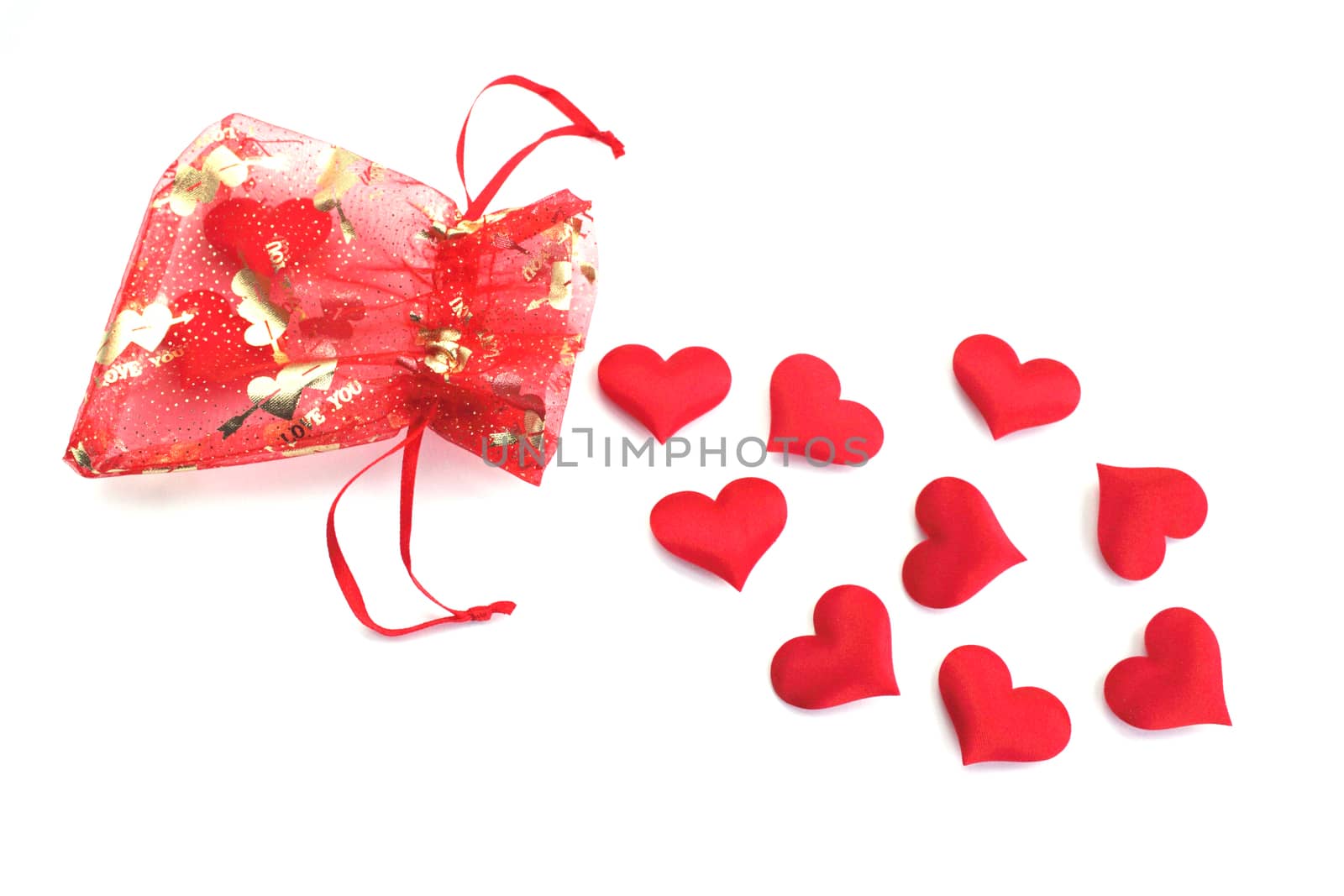 Hearts falling out from the bag against the white background