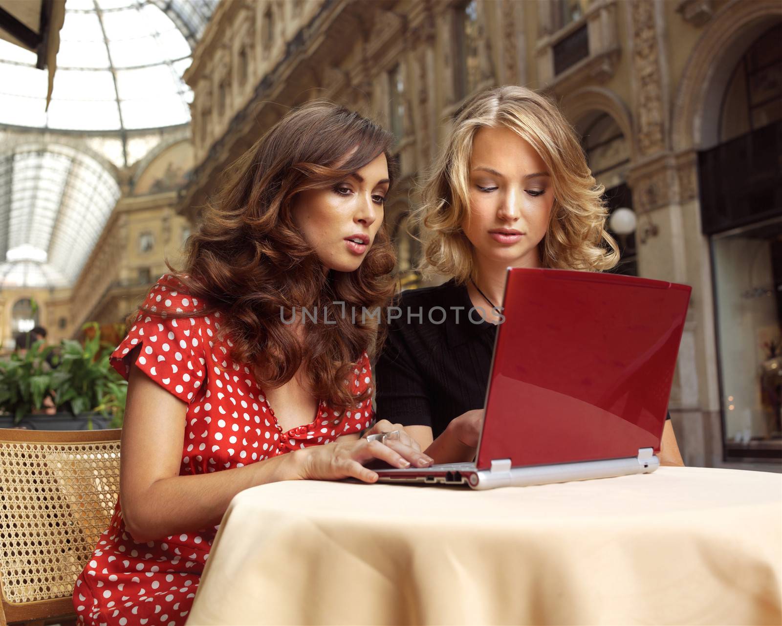 happy businesswomen with laptop by toocan