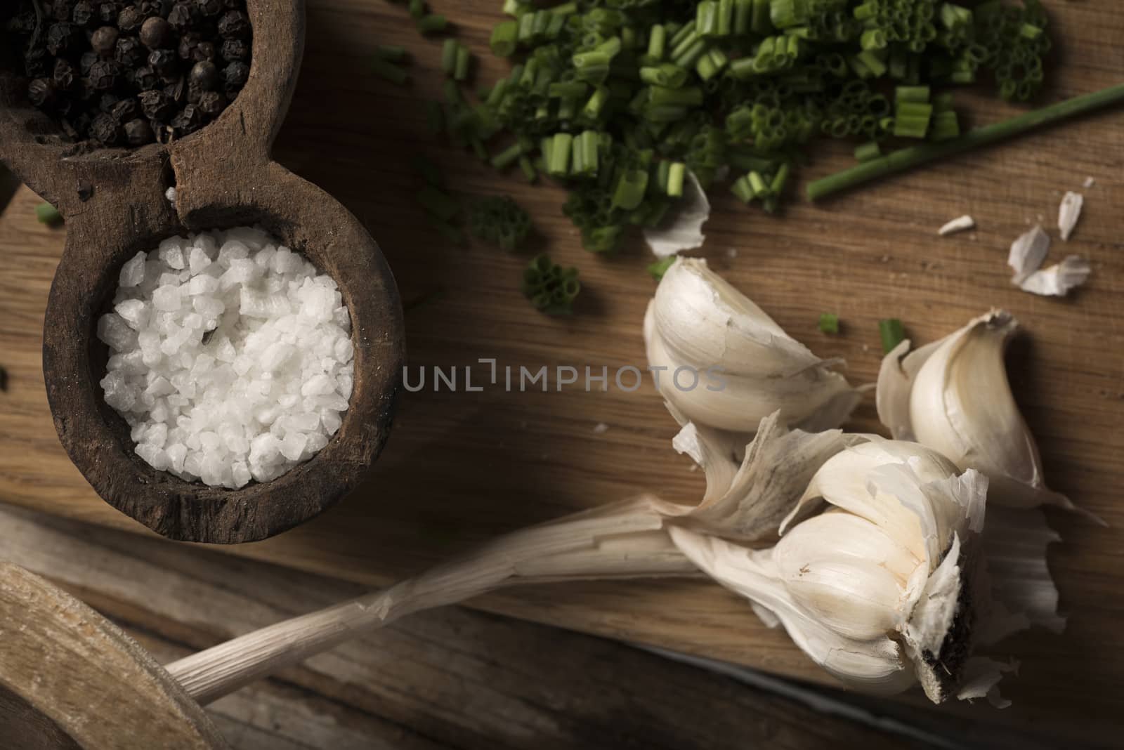 Salad preparation on a traditional wooden table