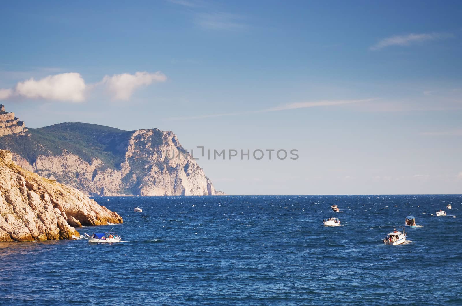 pleasure boats sail the high seas