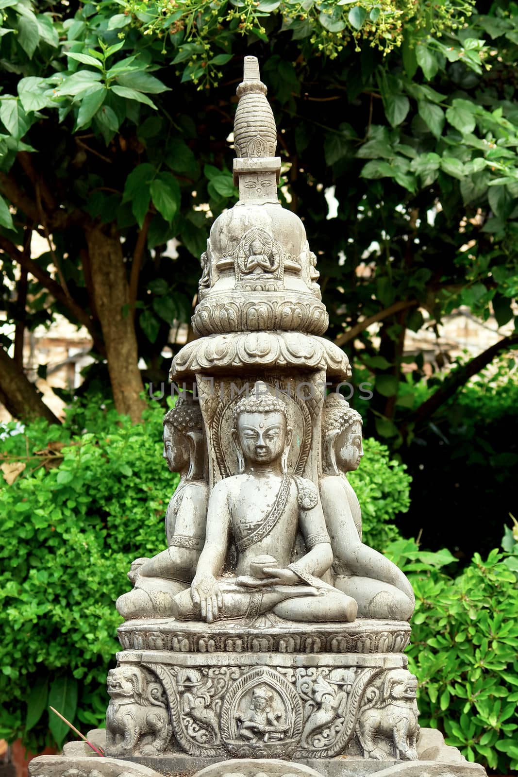 Buddha statue at Swayambhunath stupa temple on the outskirts of Kathmandu, Nepal. Unesco world heritage site (aslo known as "monkey temple")                               